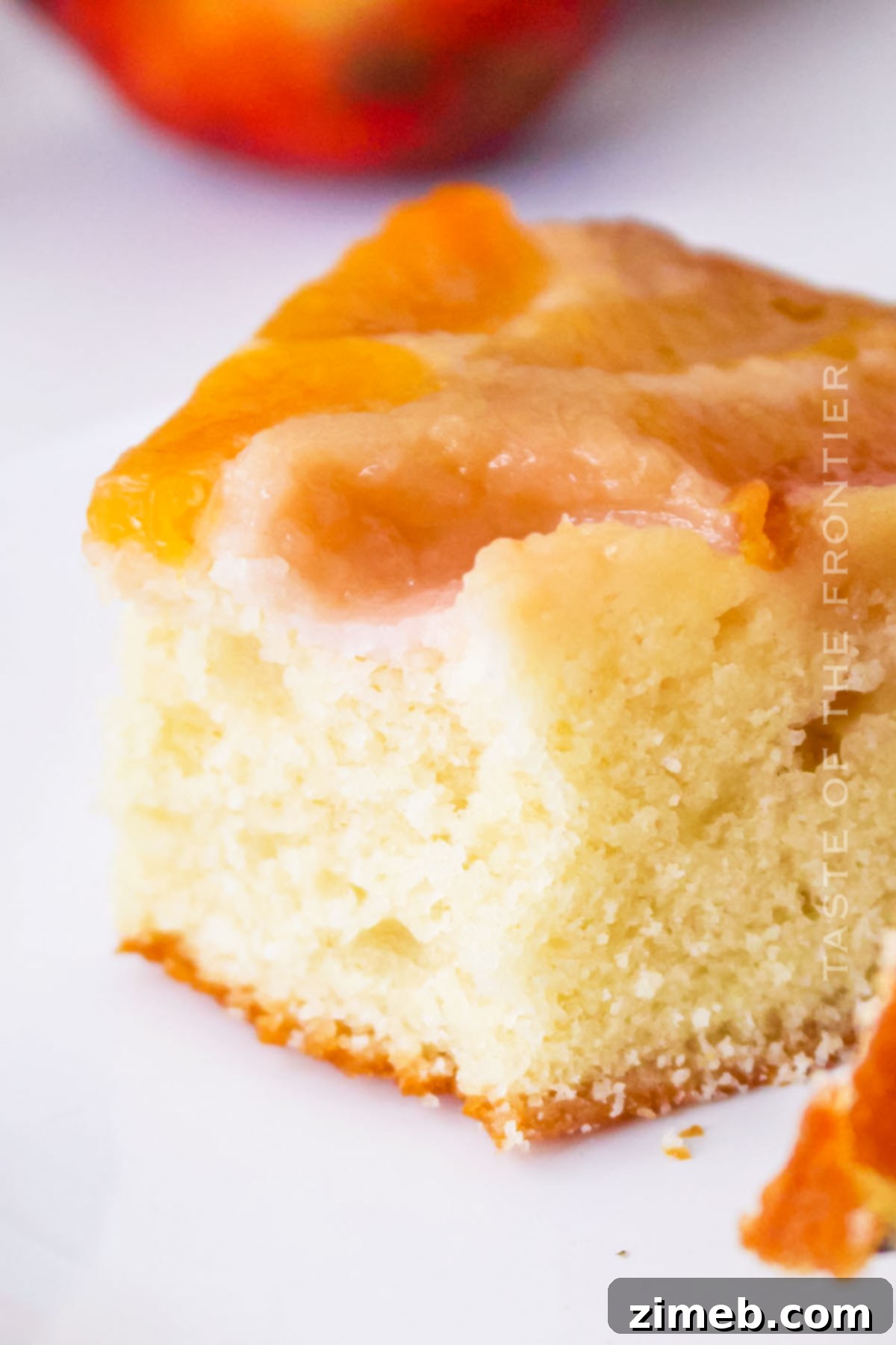 moist cake with summer fruit and caramelized peaches