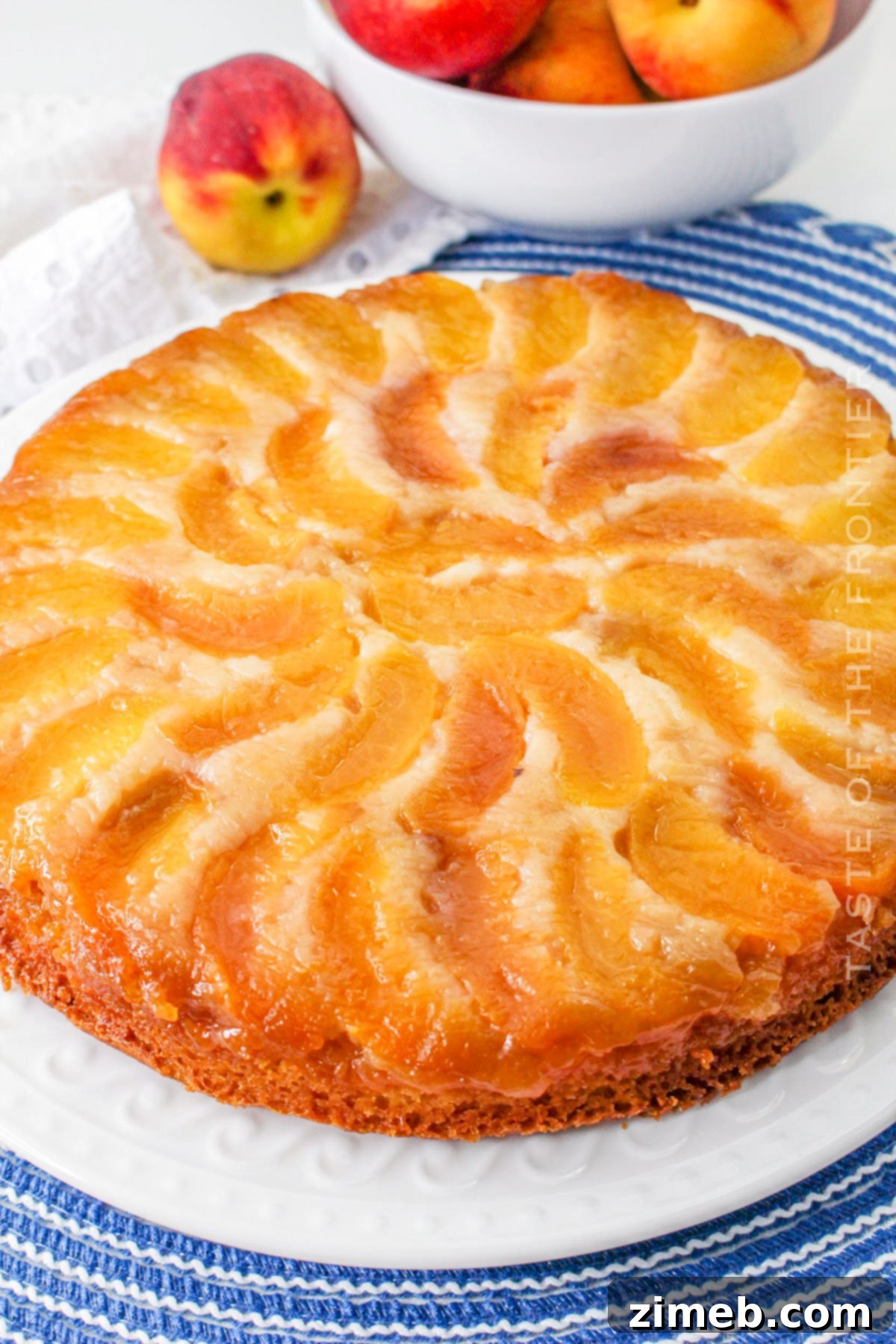 peach cake with fresh peaches and caramel glaze