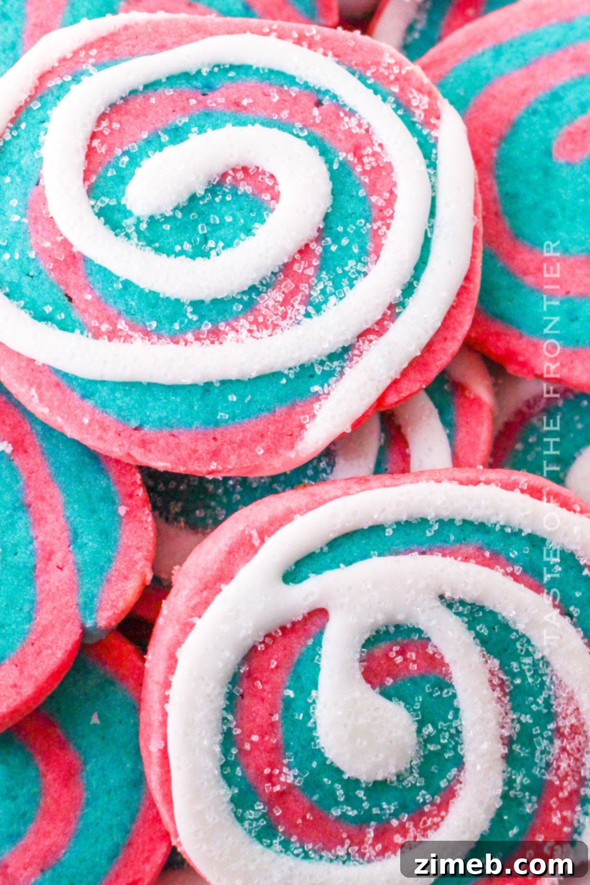 Cute birthday party cookies with pink and blue swirls