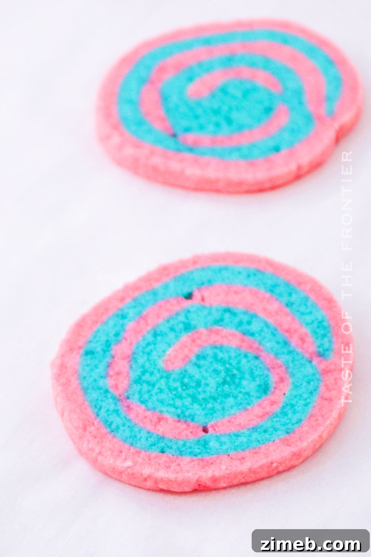 Baked pink and blue swirl pinwheel cookies