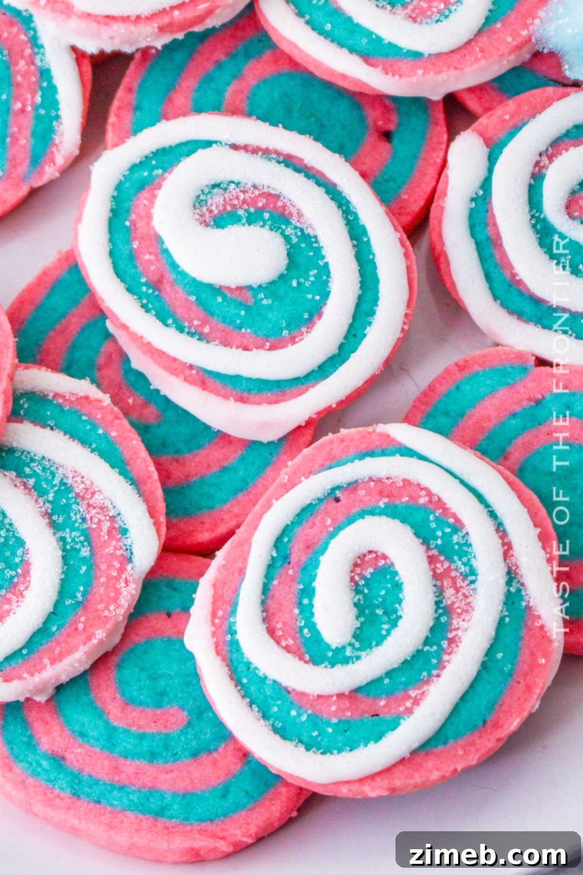 Close-up of baked Cotton Candy Cookies with a clear recipe title