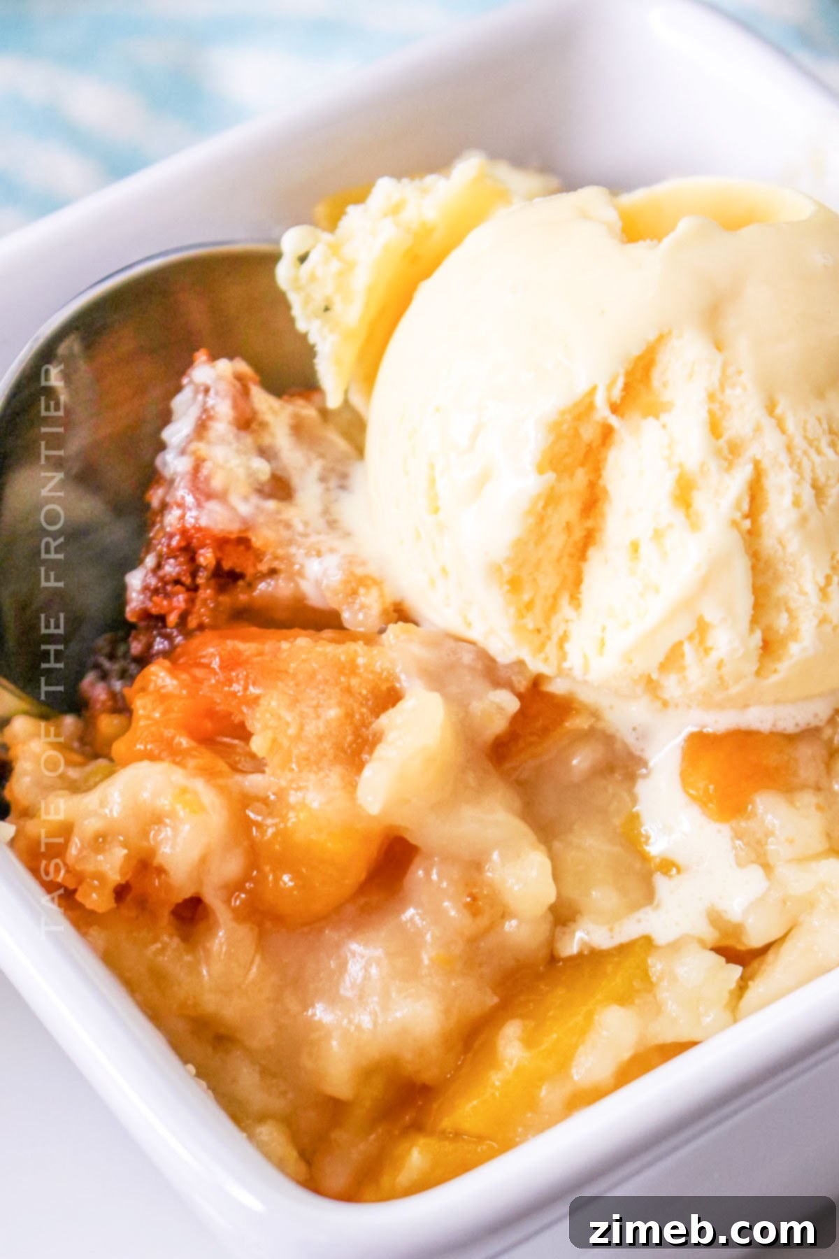 Effortless Slow Cooker Peach Cobbler with Bisquick 2 Slow Cooker Peach Cobbler with Bisquick - A delightful and easy peach dessert perfect for any occasion.