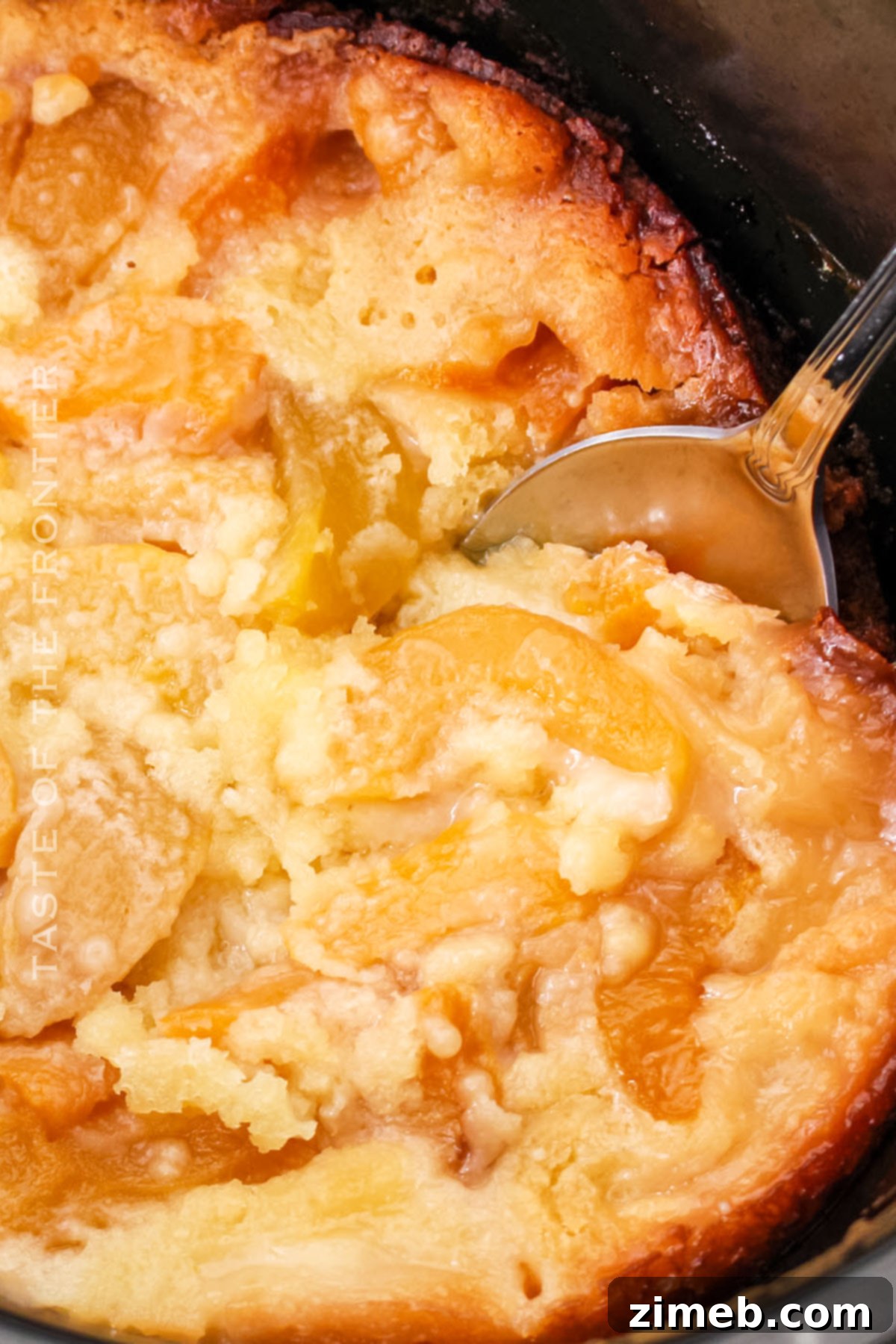 Effortless Slow Cooker Peach Cobbler with Bisquick 8 Slow cooker peach dessert bubbling away