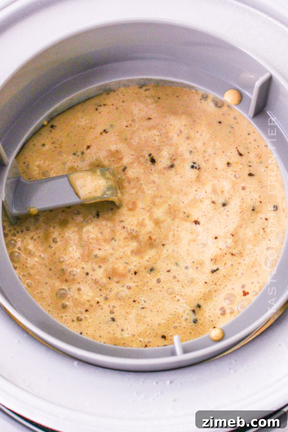 Decadent Mississippi Mud Ice Cream 4 churning the ice cream in an ice cream maker