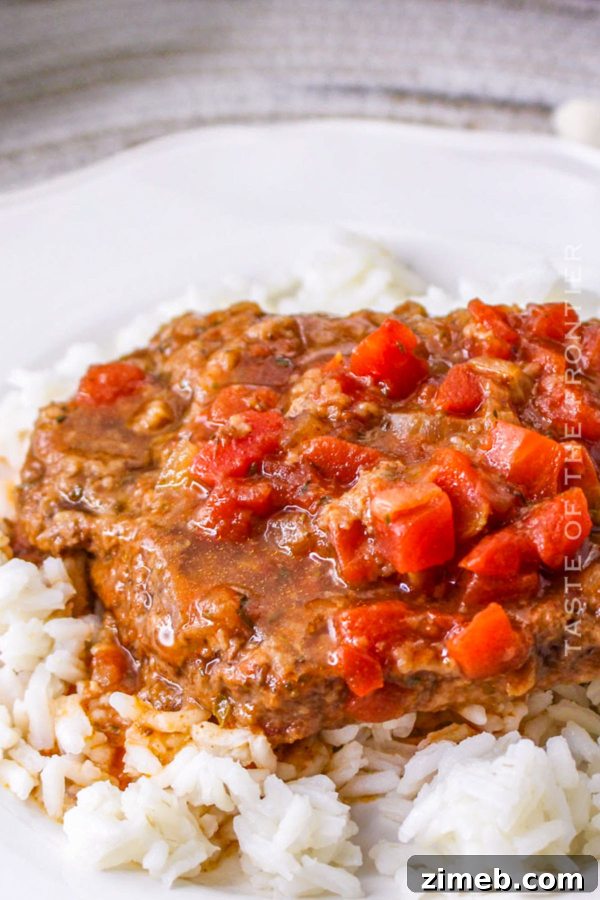 Comforting Slow Cooker Cubed Steak 15 Beef on rice dinner with gravy