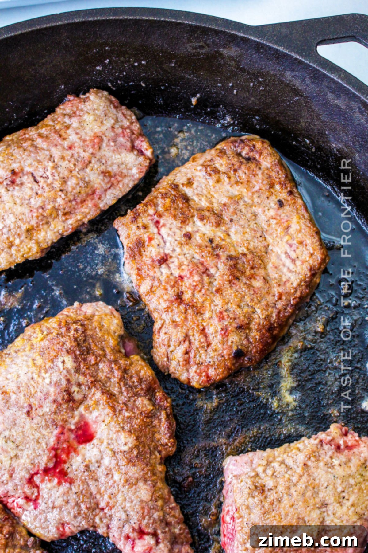 Comforting Slow Cooker Cubed Steak 5 Browning Cubed Steak in a Skillet before Slow Cooking