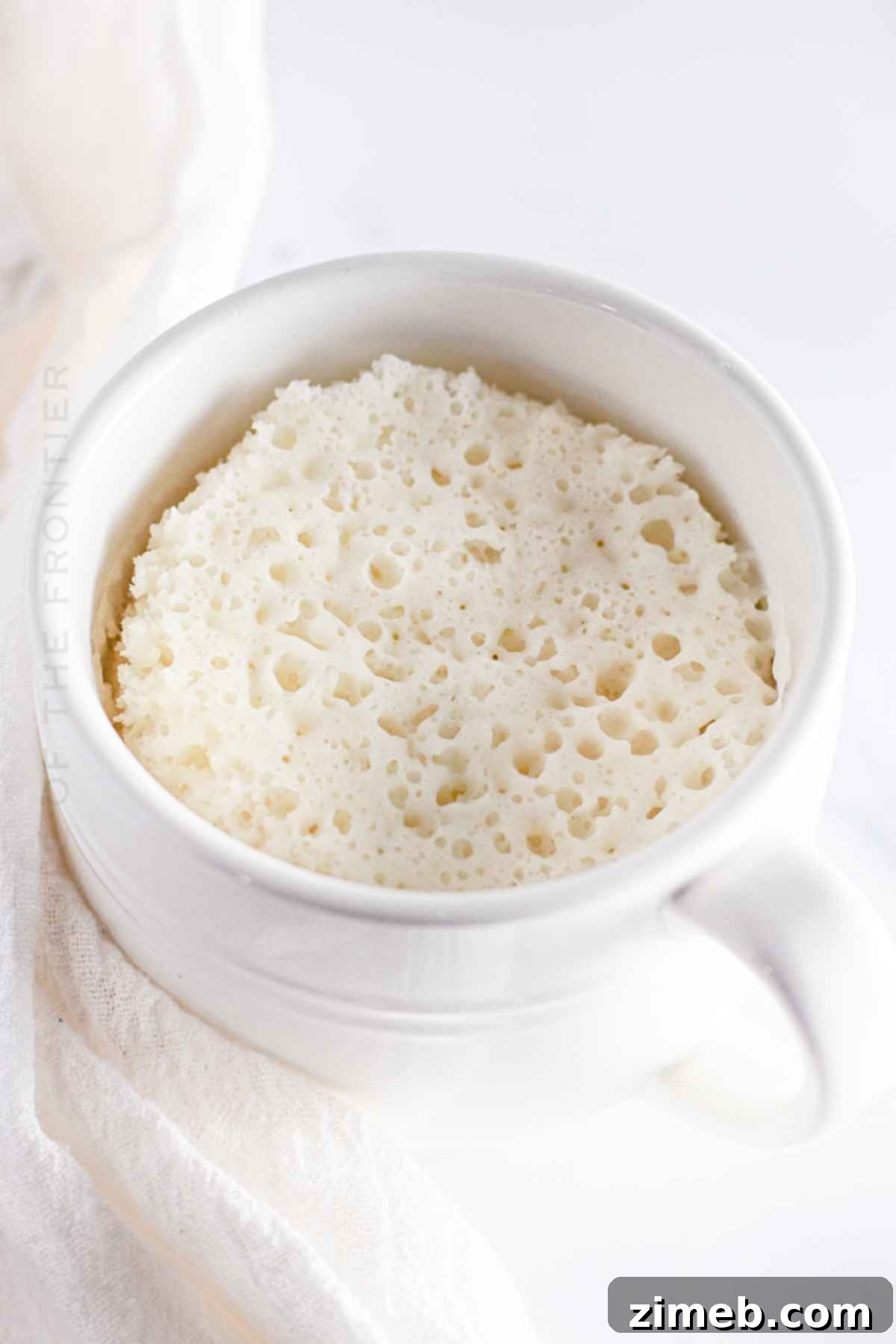 Easy Cake Mix Mug Treats 7 Making a Cake Mix Mug Cake in the microwave