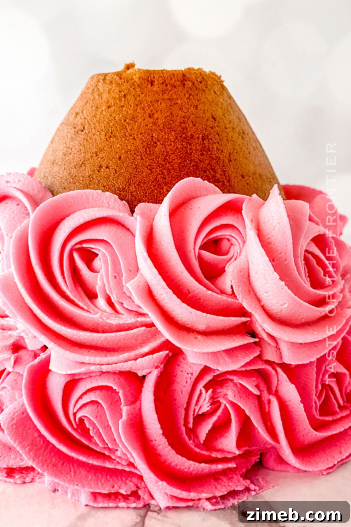 adding the frosting rosettets