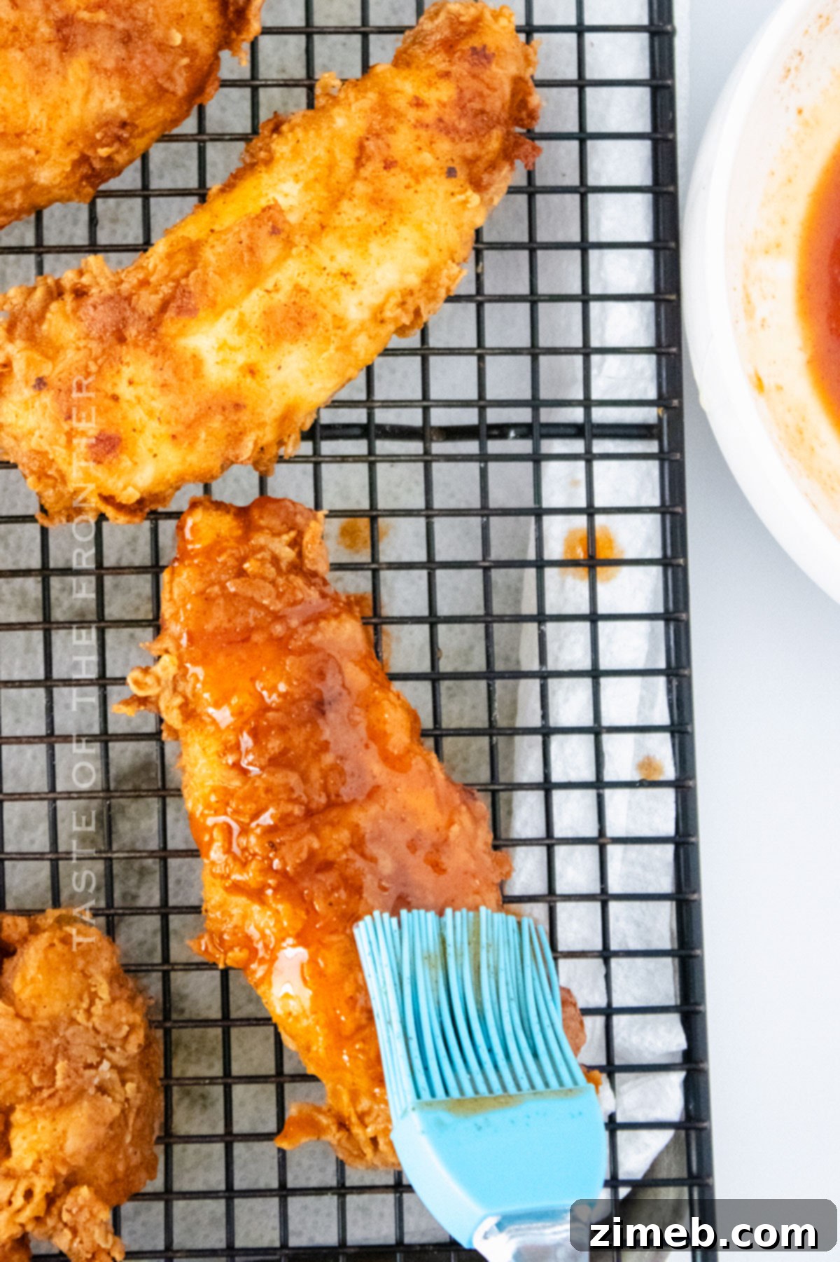 adding the sweet and spicy sauce