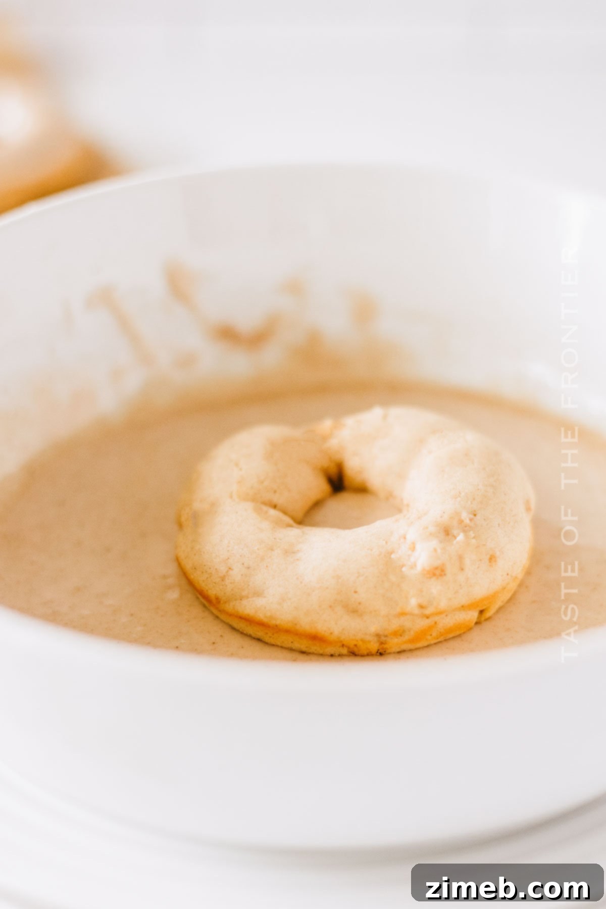 Cinnamon Toast Crunch Craze Doughnuts 6 adding the glaze