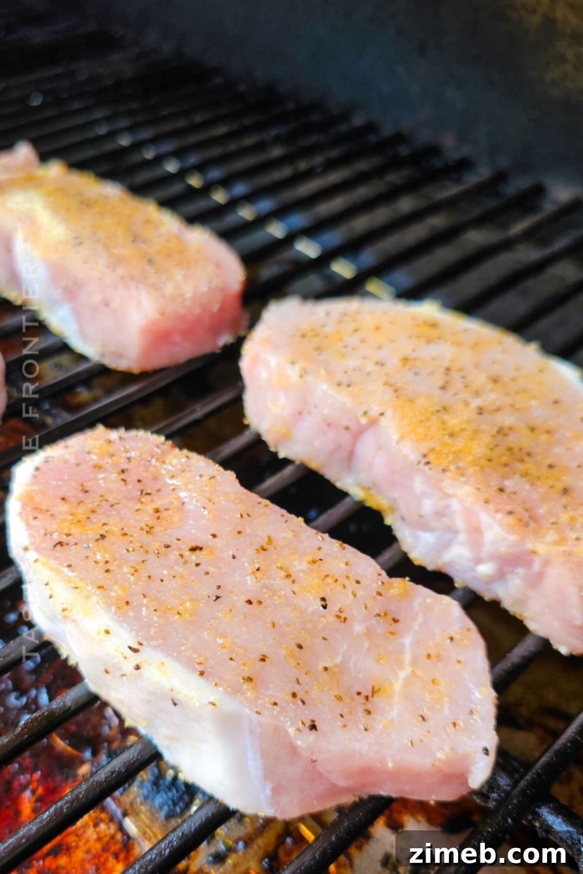 pork on the smoker cooking