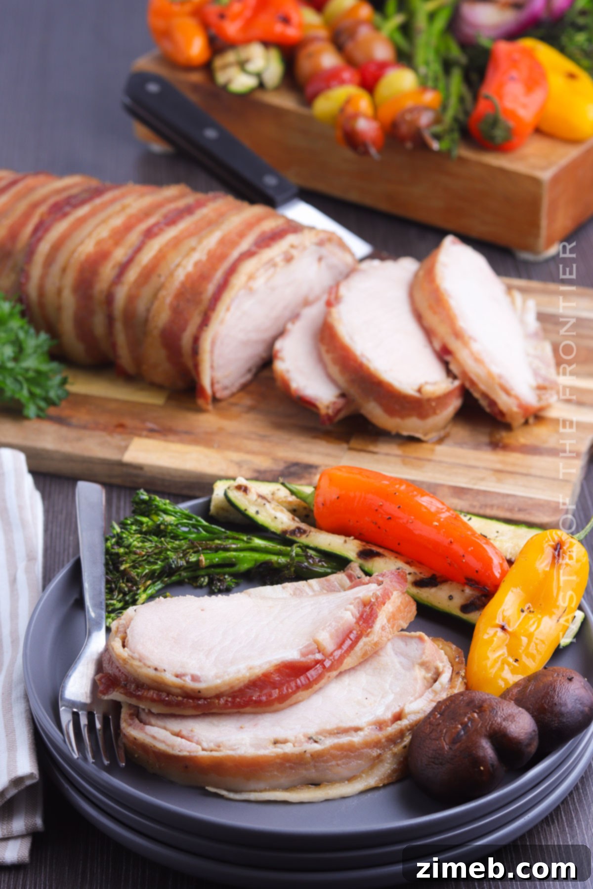Tender Smoked Pork Loin 3 Perfectly cooked pork loin dinner with crispy bacon