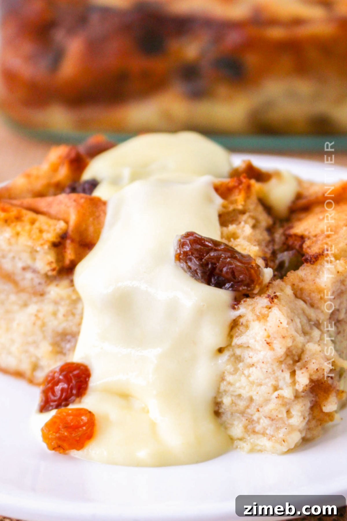 Warm Bread Pudding Drizzled with Vanilla Cream 2 Bread Pudding with Vanilla Sauce