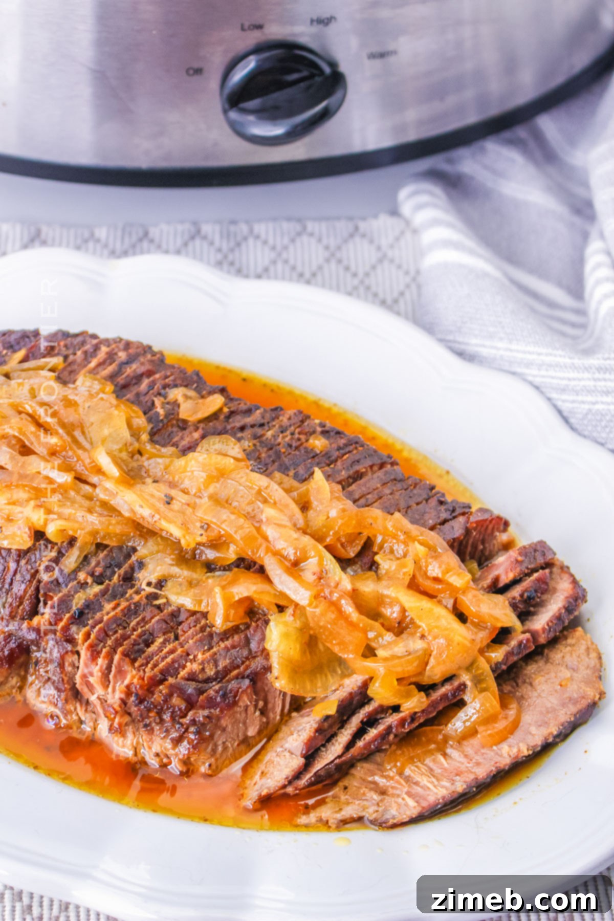 Melt-in-Your-Mouth Slow Cooker Flank Steak 13 Tender steak and onions from the slow cooker