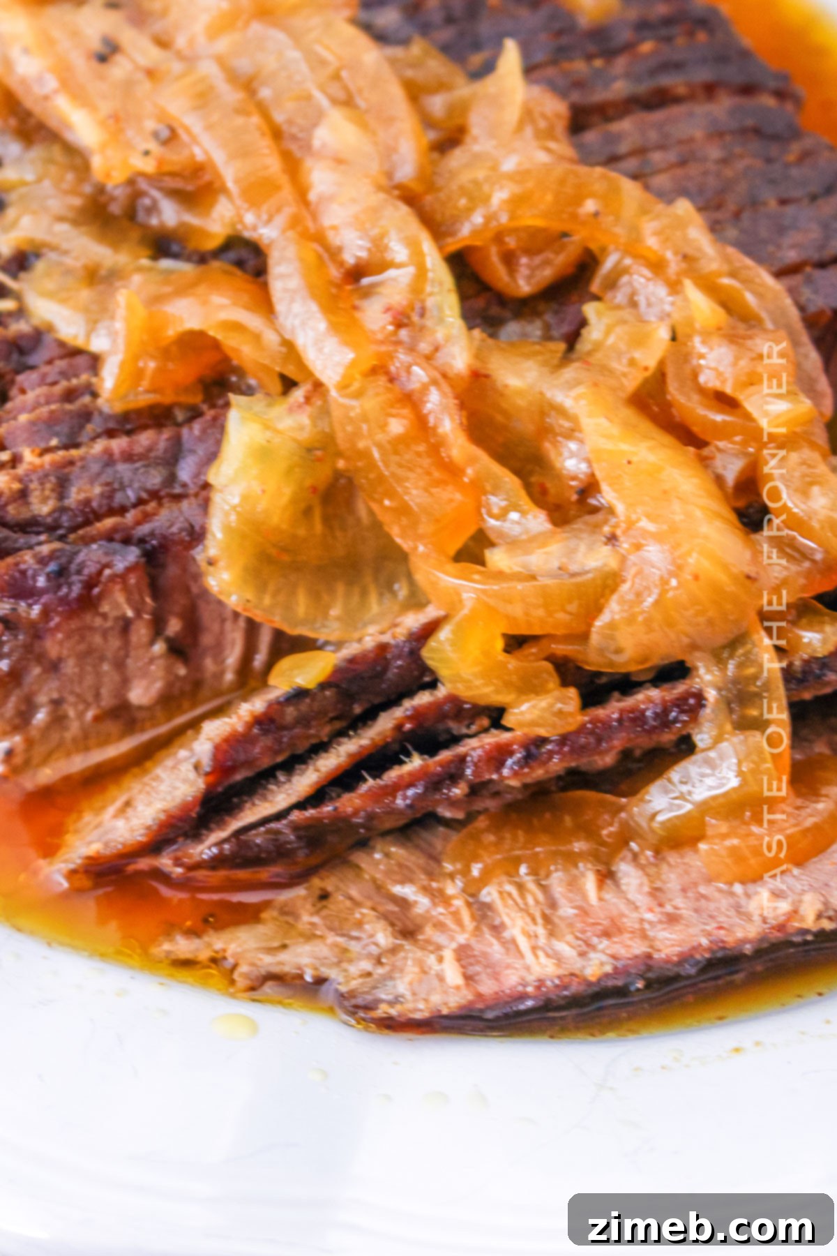 Melt-in-Your-Mouth Slow Cooker Flank Steak 6 how to make Slow Cooked Flank Steak - Sliced and ready to serve