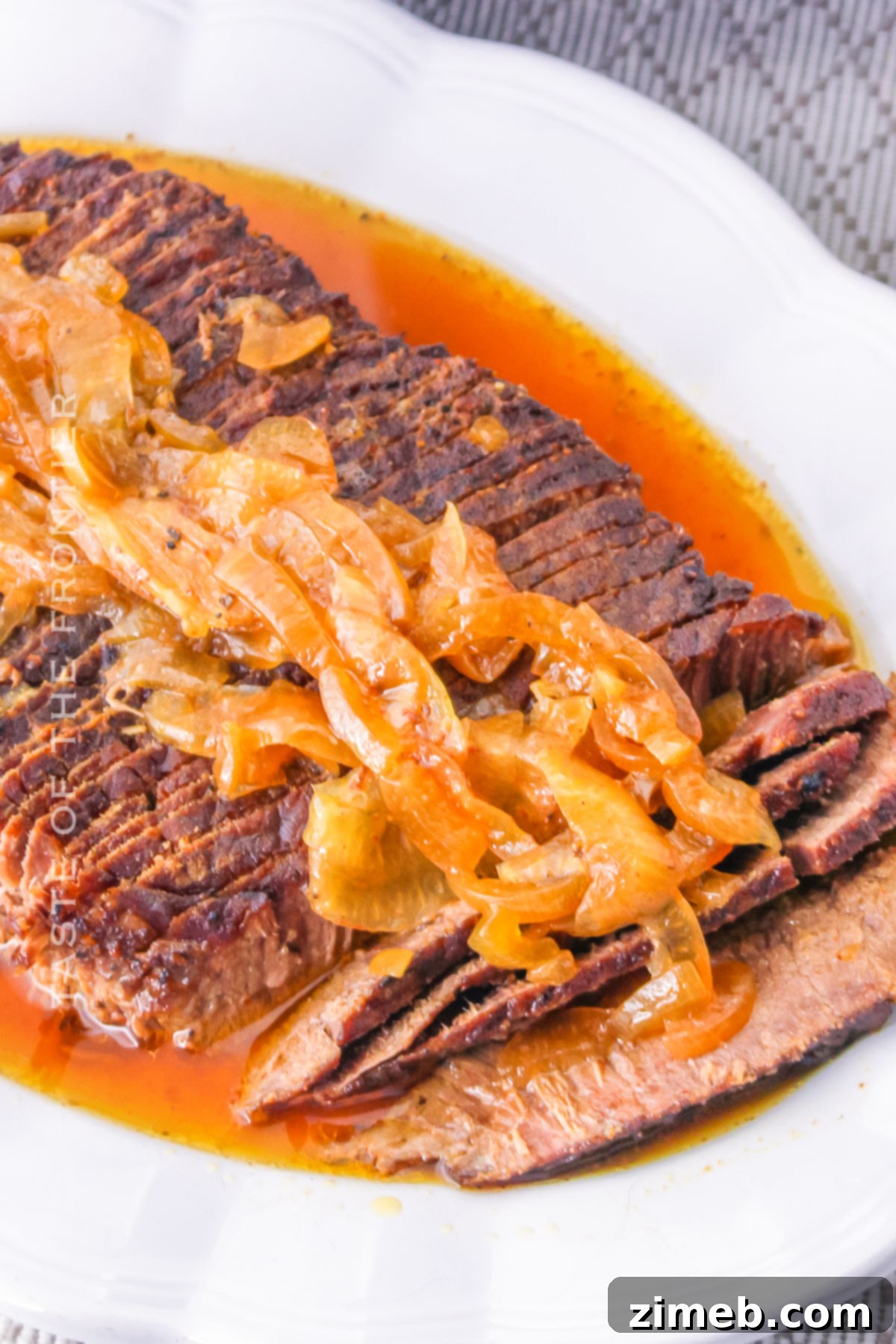 Melt-in-Your-Mouth Slow Cooker Flank Steak 7 steak dinner in the crockpot - a comforting meal for any night