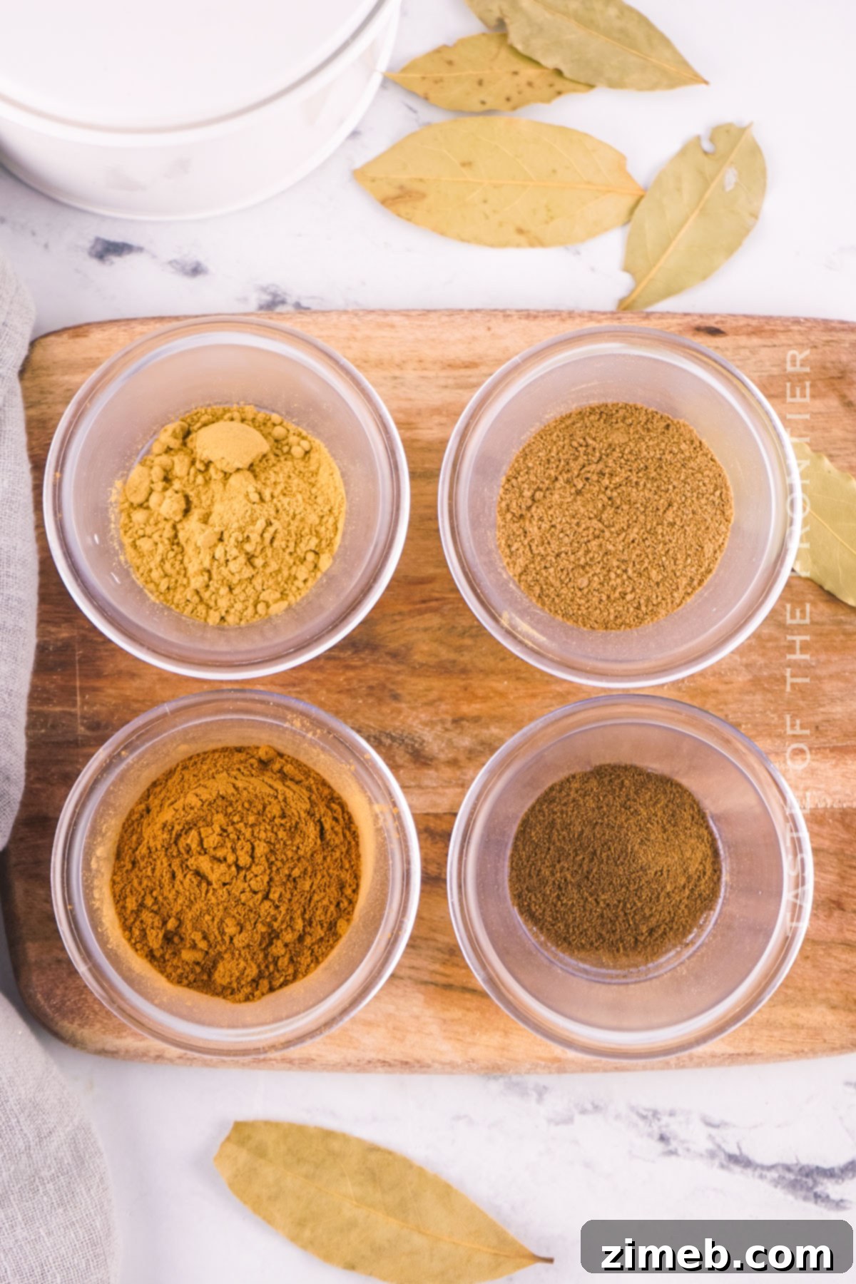Your Signature Pumpkin Pie Spice From Scratch 4 Individual spices (cinnamon, ginger, nutmeg, allspice) laid out, ready for making pumpkin pie spice
