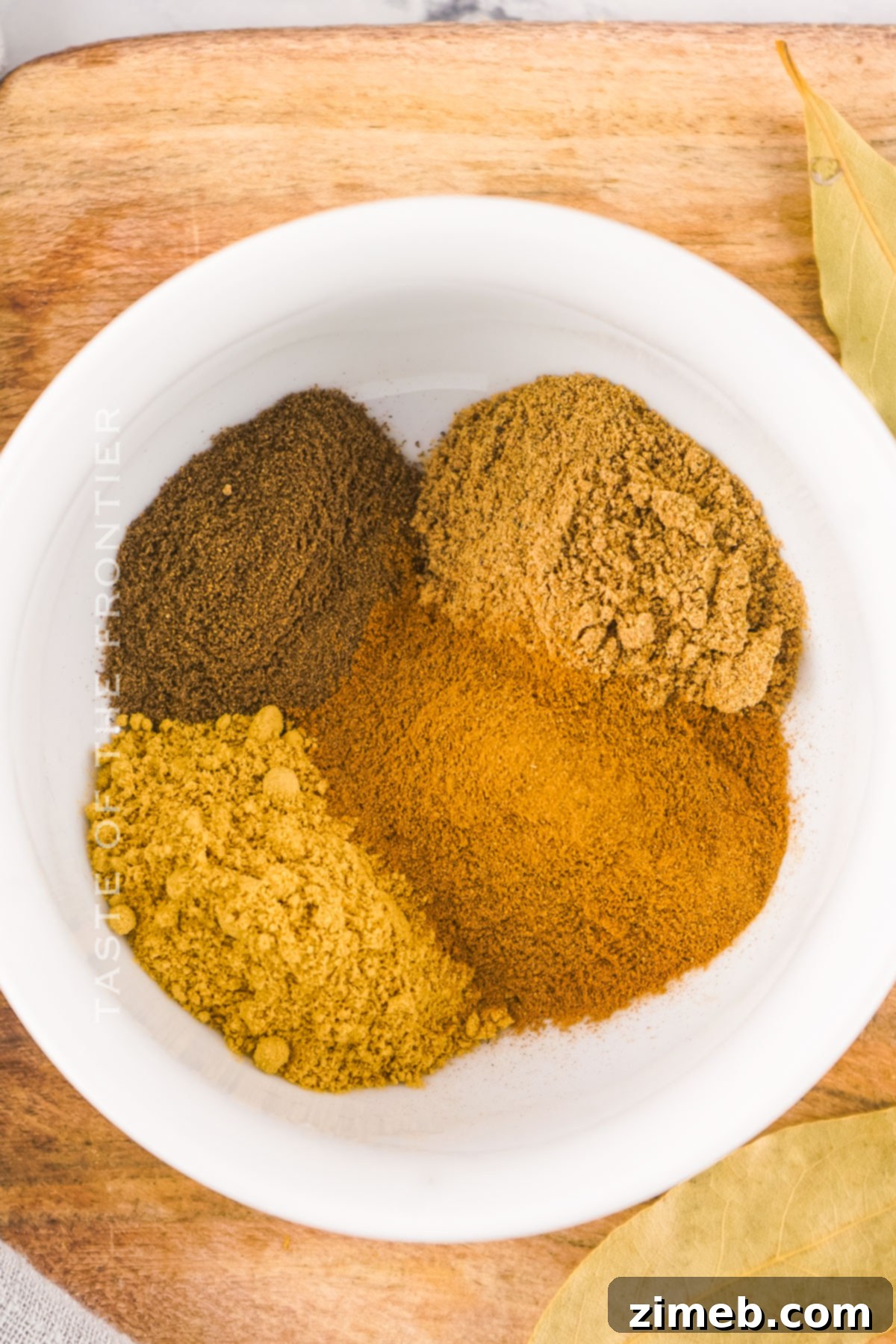 Your Signature Pumpkin Pie Spice From Scratch 5 Finished pumpkin pie spice blend in a small wooden bowl