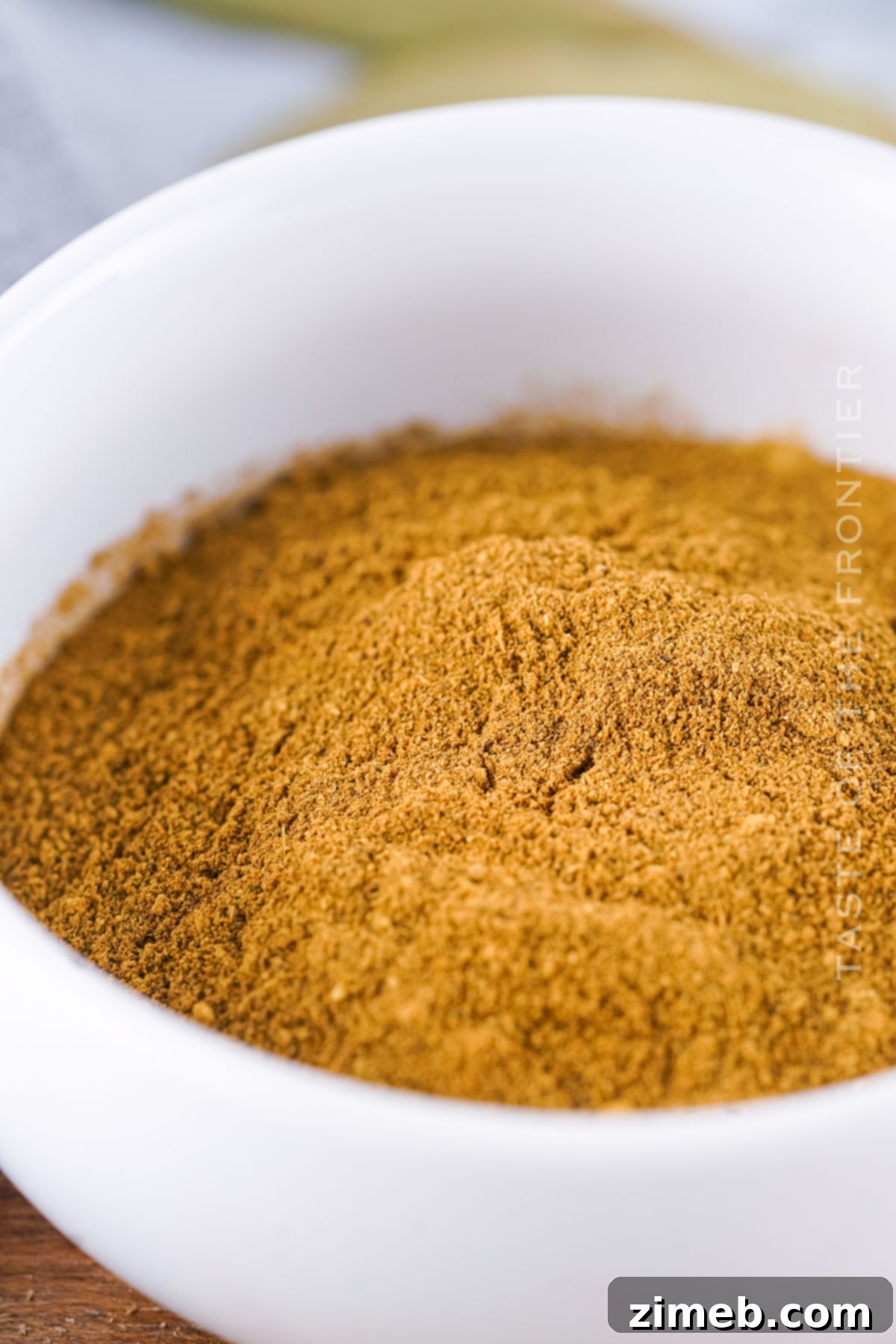 Your Signature Pumpkin Pie Spice From Scratch 6 Close-up of homemade pumpkin pie spice in a jar with fall decor