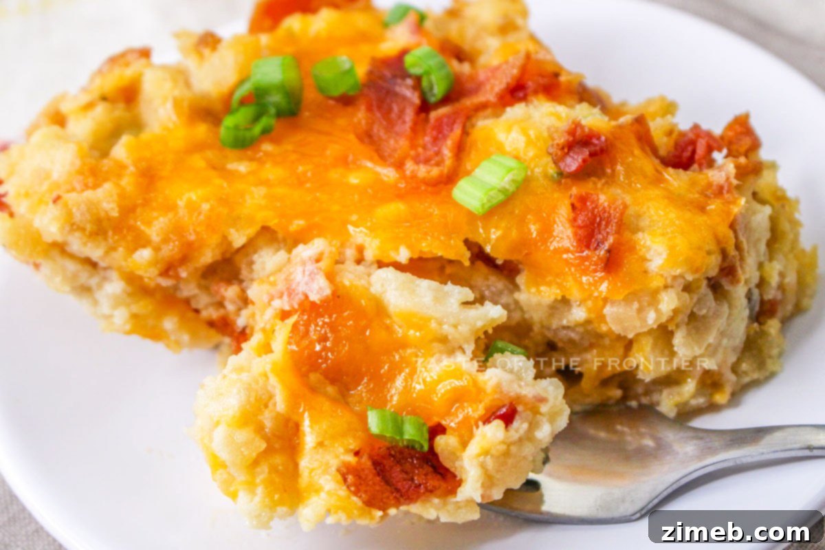Loaded Cheesy Potato Casserole - a comforting and satisfying dish with bacon and cheddar.