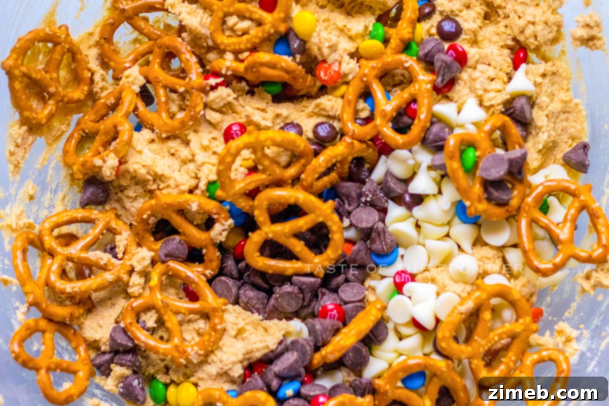 The Monster Cookie Dough 6 mixing the candy in