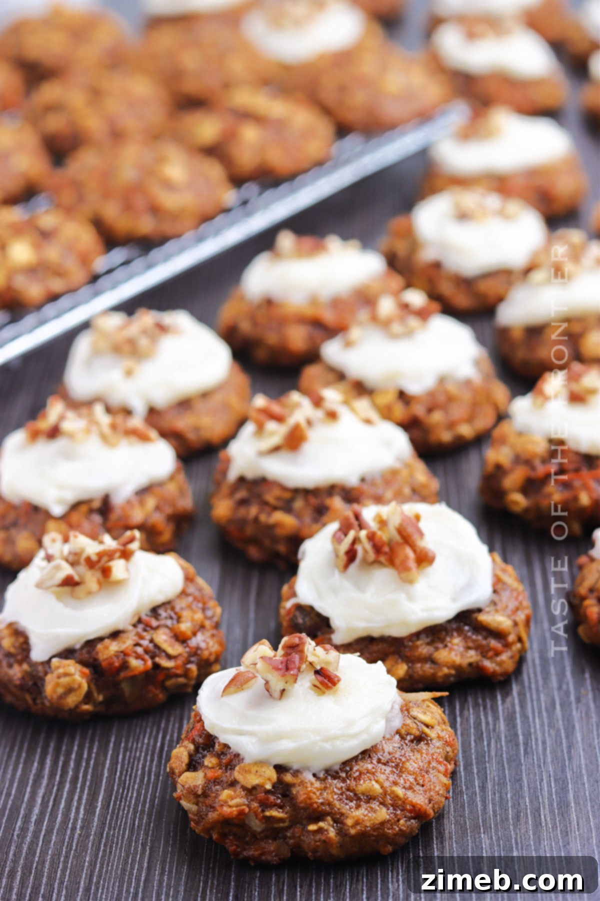 Holiday-themed frosted cookies, including Carrot Cake Cookies, arranged beautifully