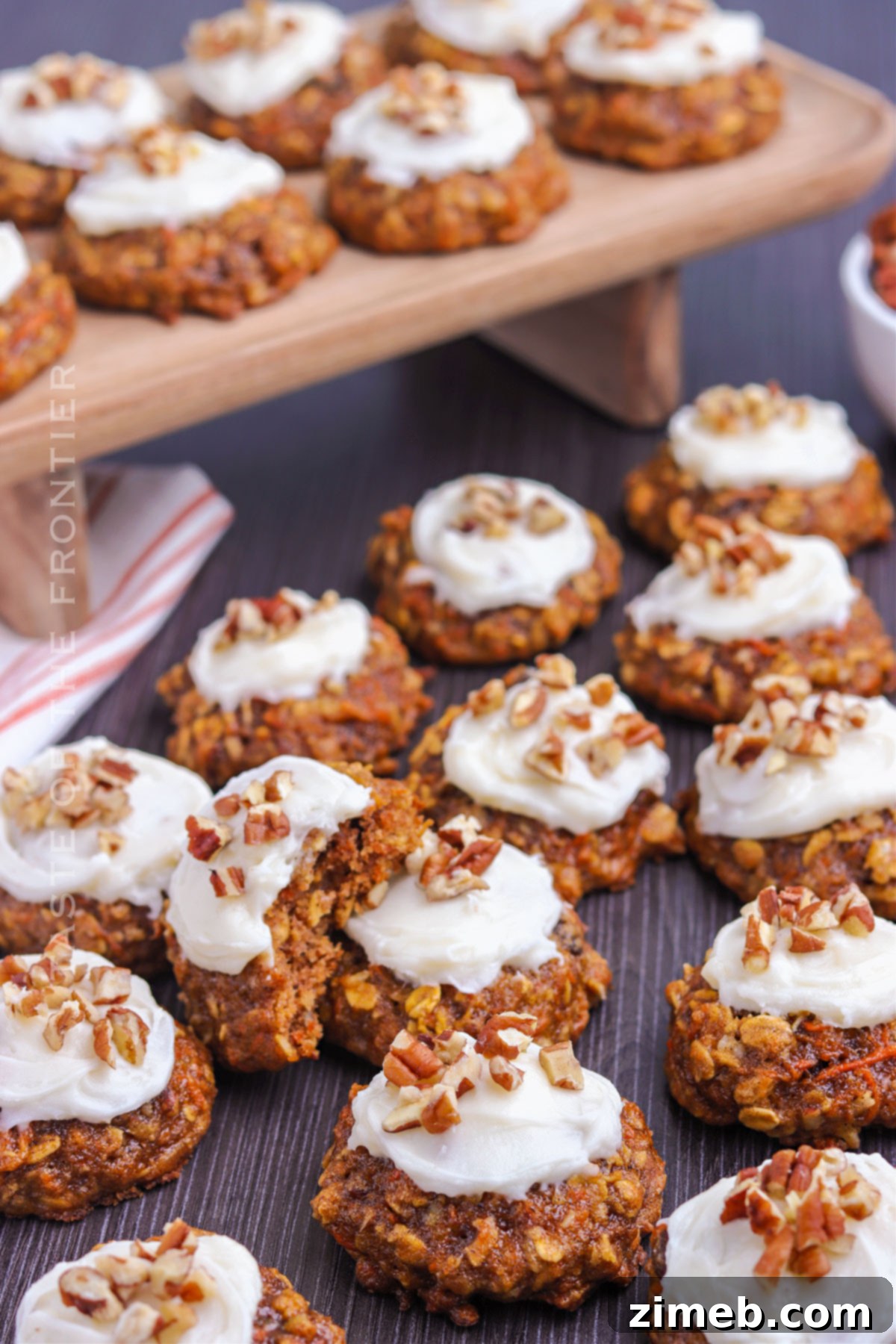 Assortment of festive carrot desserts, including carrot cake, cupcakes, and cookies