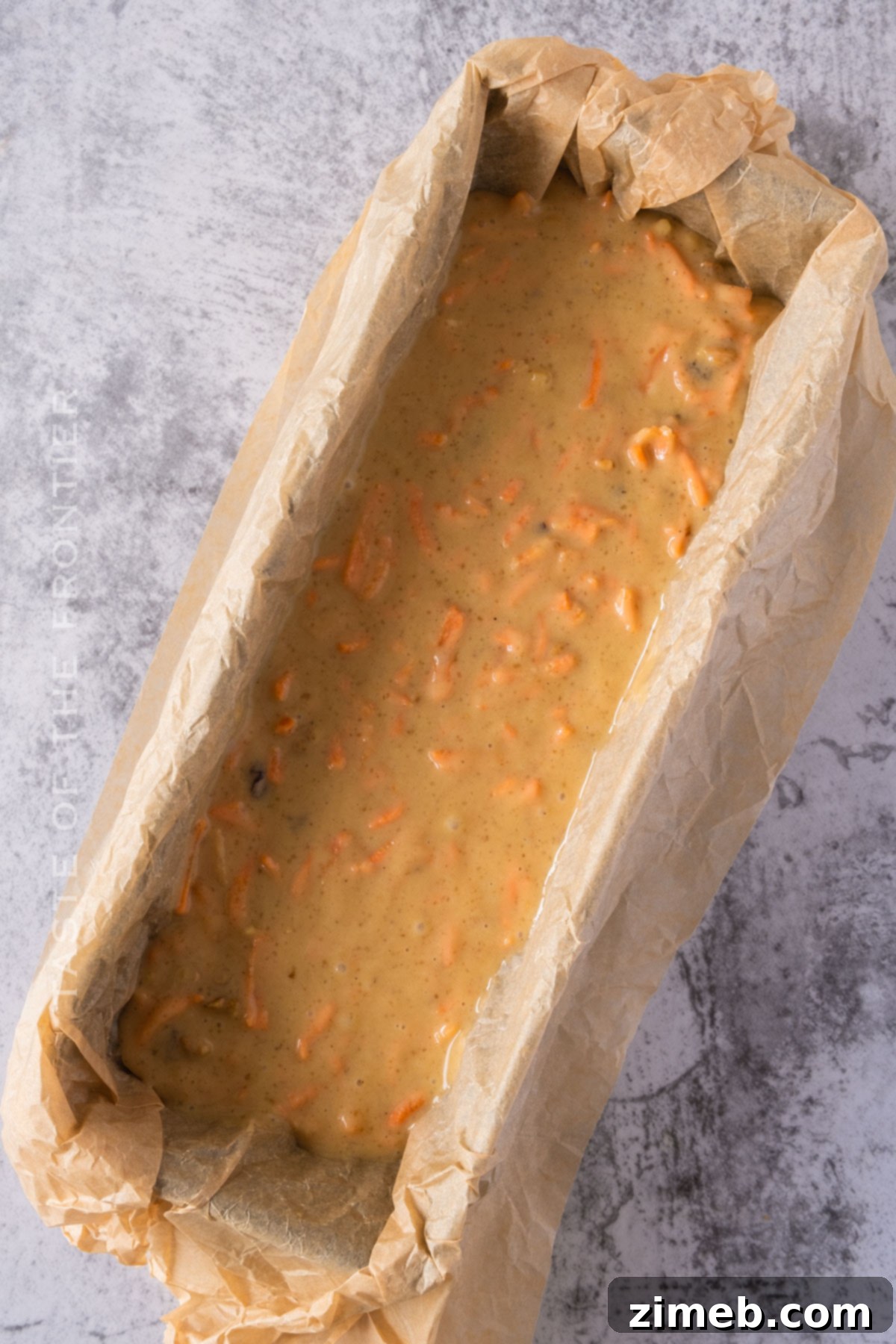 Moist Carrot Bread 6 Carrot bread batter ready to bake in a loaf pan.