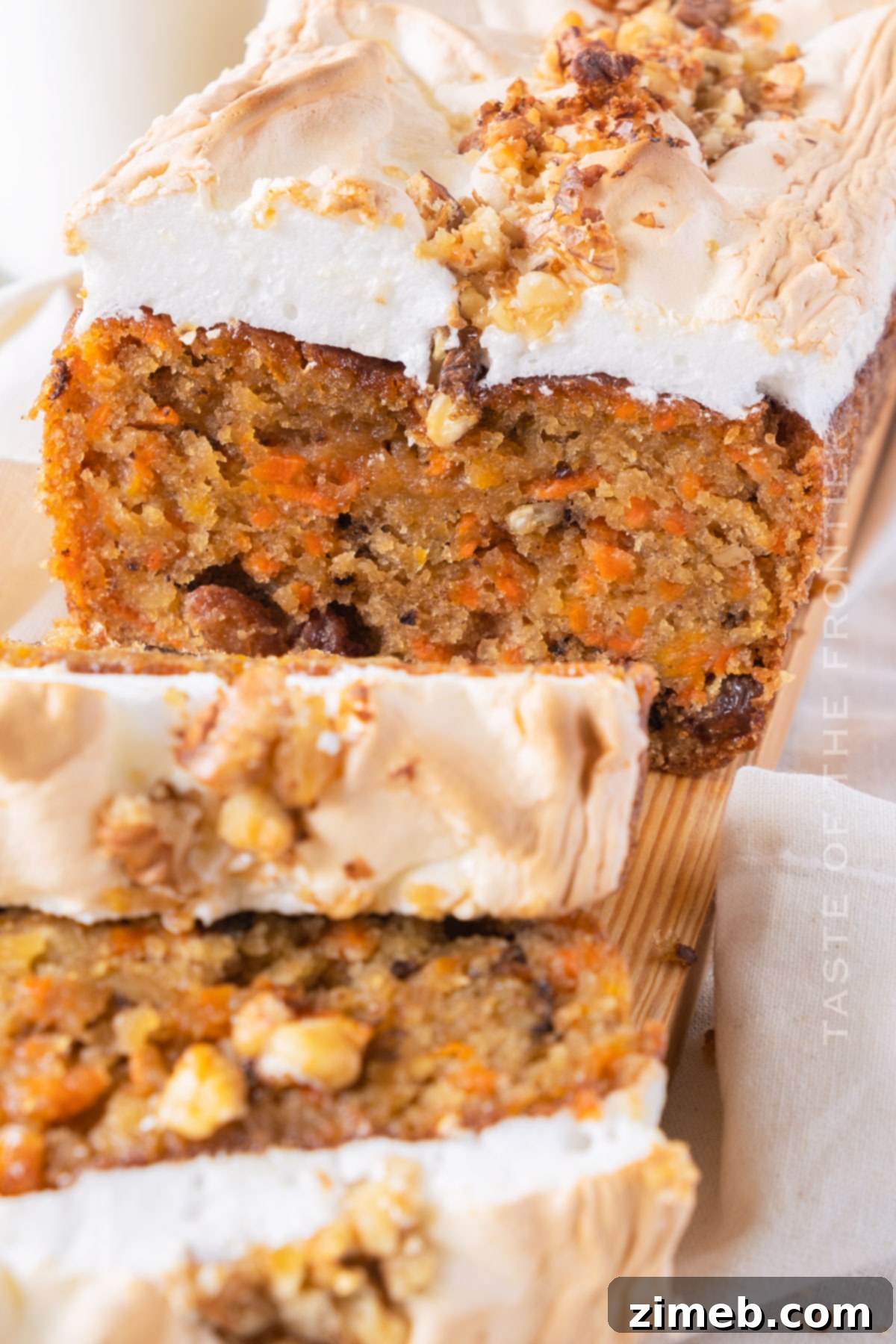Moist Carrot Bread 7 A freshly baked loaf of moist Carrot Bread on a cooling rack.