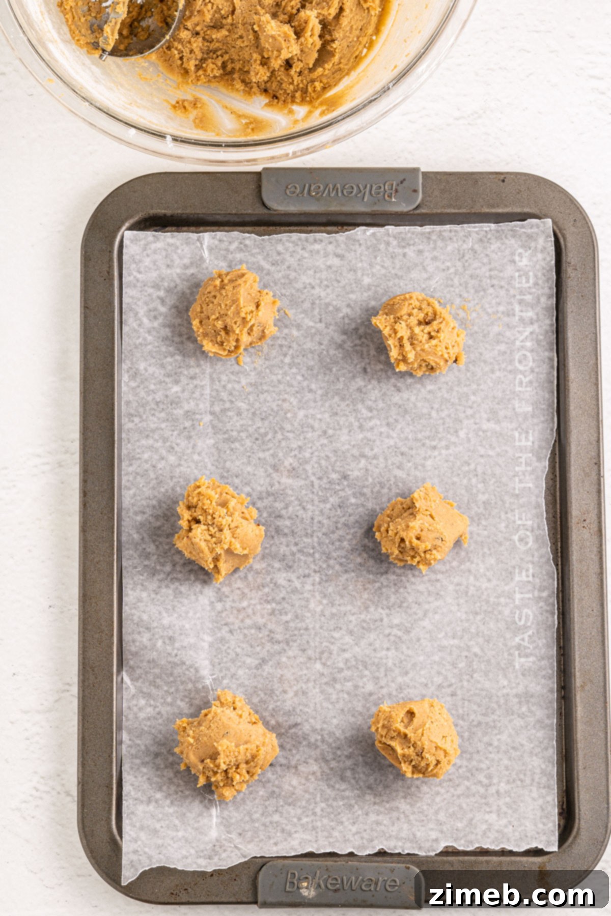 Spiced Chai Delights 7 How to make Chai Tea Cookies, showing a finished cookie on a cooling rack.