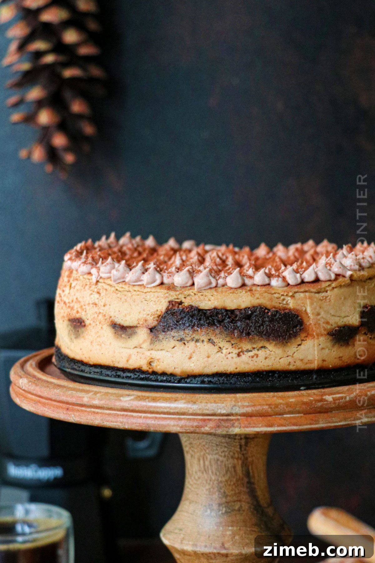 Tiramisu Cheesecake recipe showing a slice with layers.