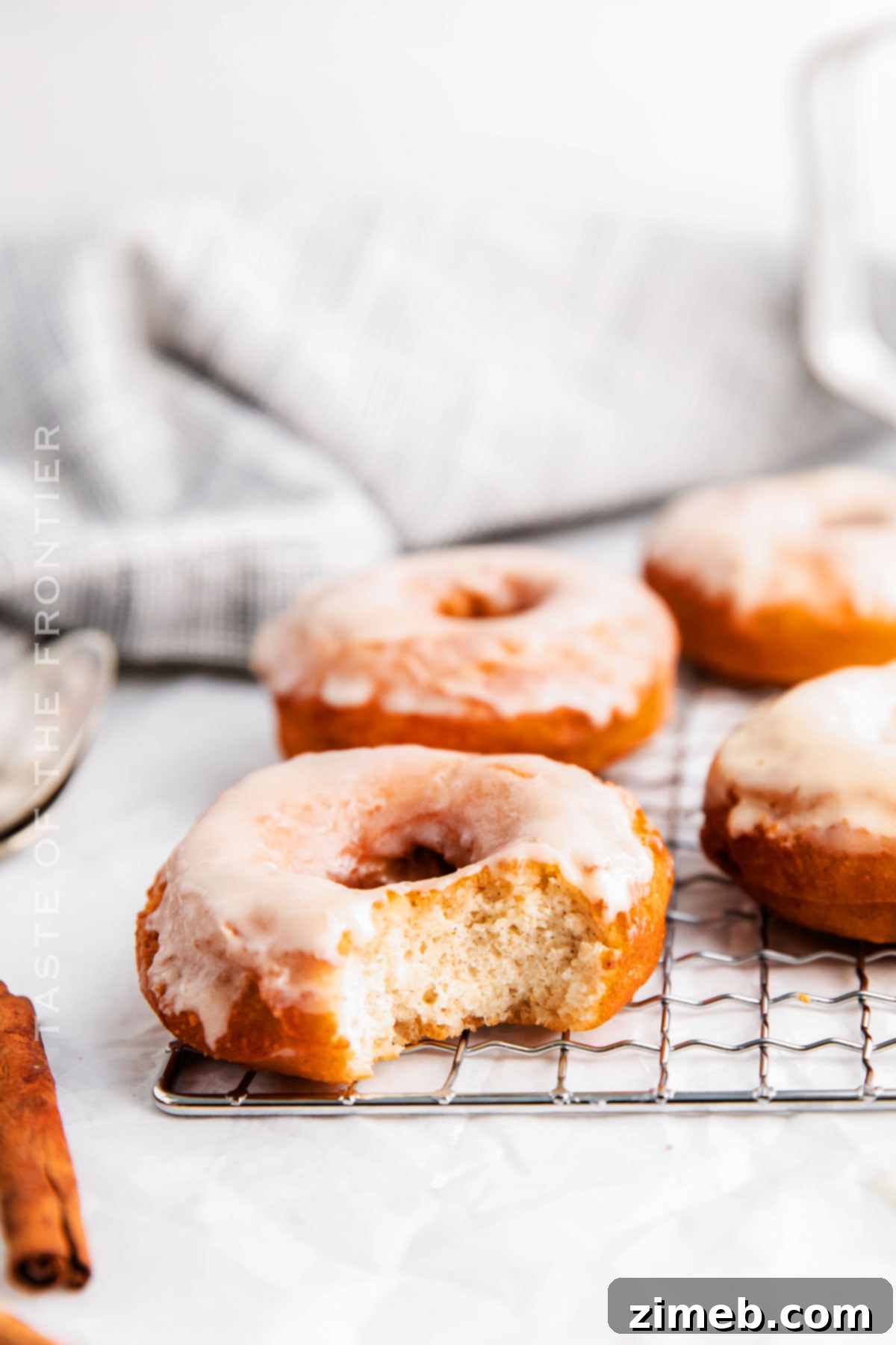 Classic Glazed Donut 8 bite out of a doughnut