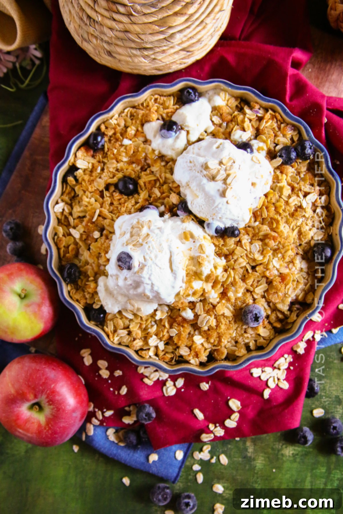 Apple and Blueberry Crumble recipe served warm, inviting a delicious spoonful.
