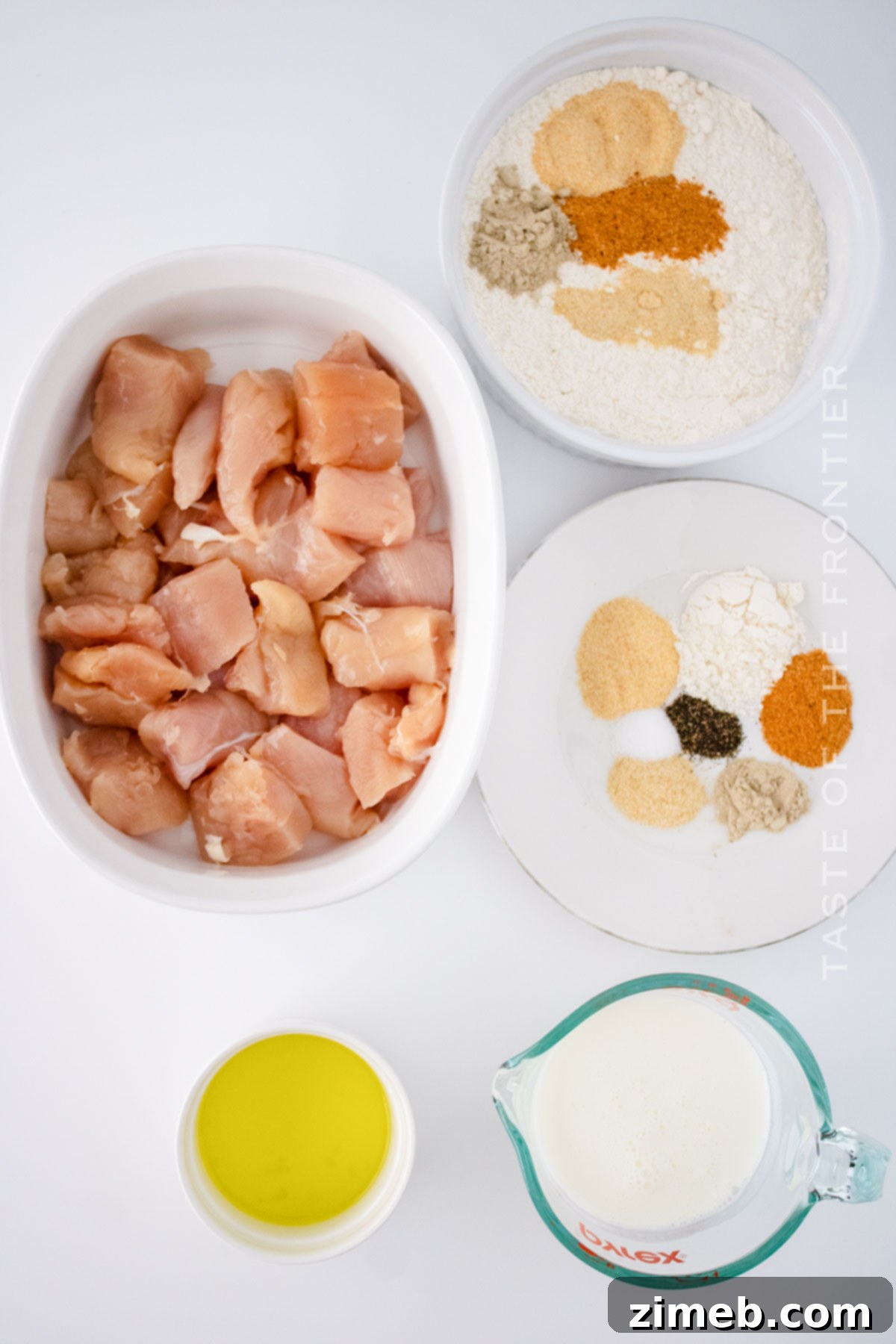 Perfectly Crispy Homemade Chicken Nuggets 4 Individual ingredients laid out for preparing homemade Chick-fil-A style chicken nuggets