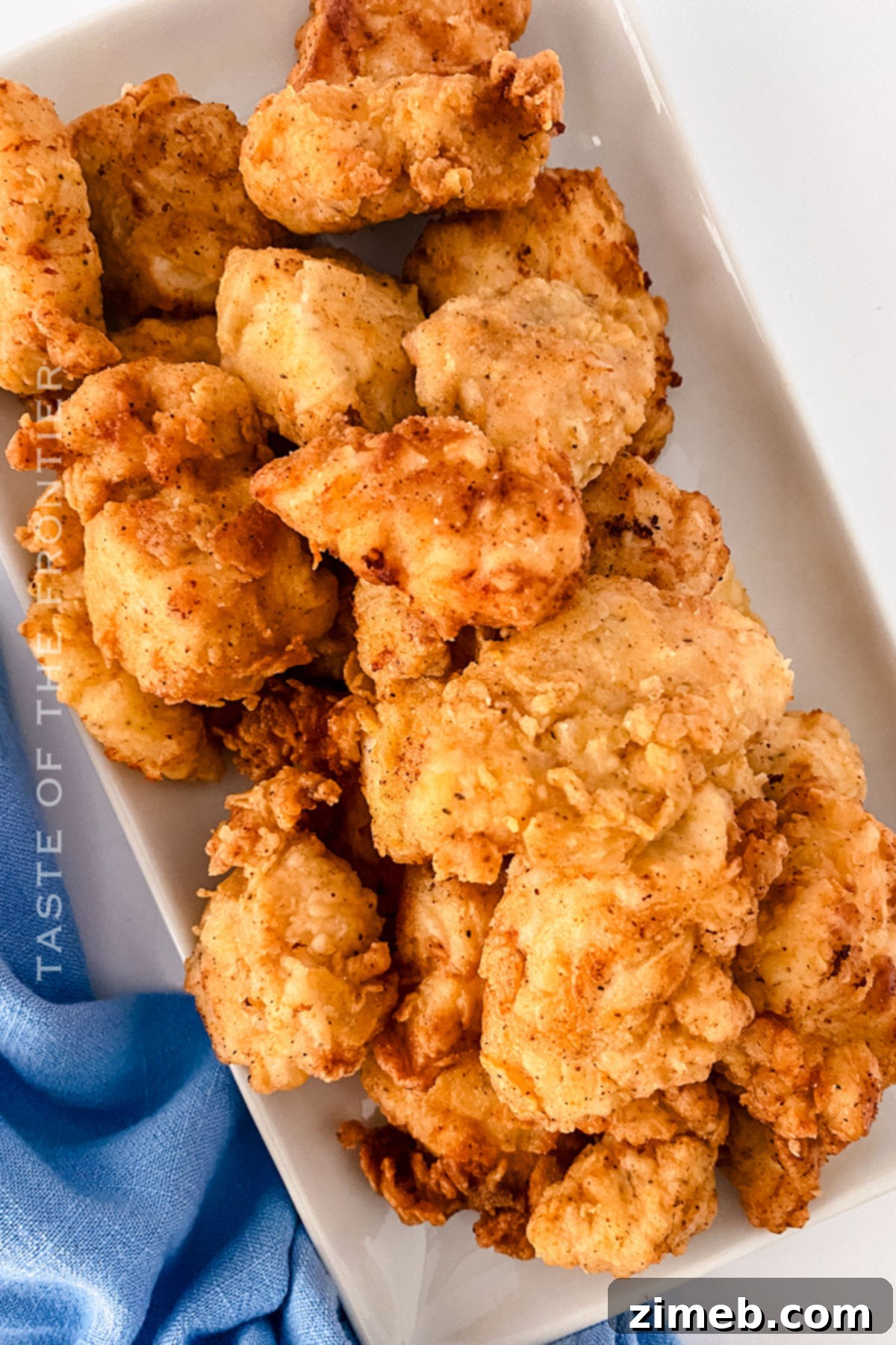 Perfectly Crispy Homemade Chicken Nuggets 7 A plate of irresistible copycat Chick-fil-A chicken nuggets with a variety of dipping sauces