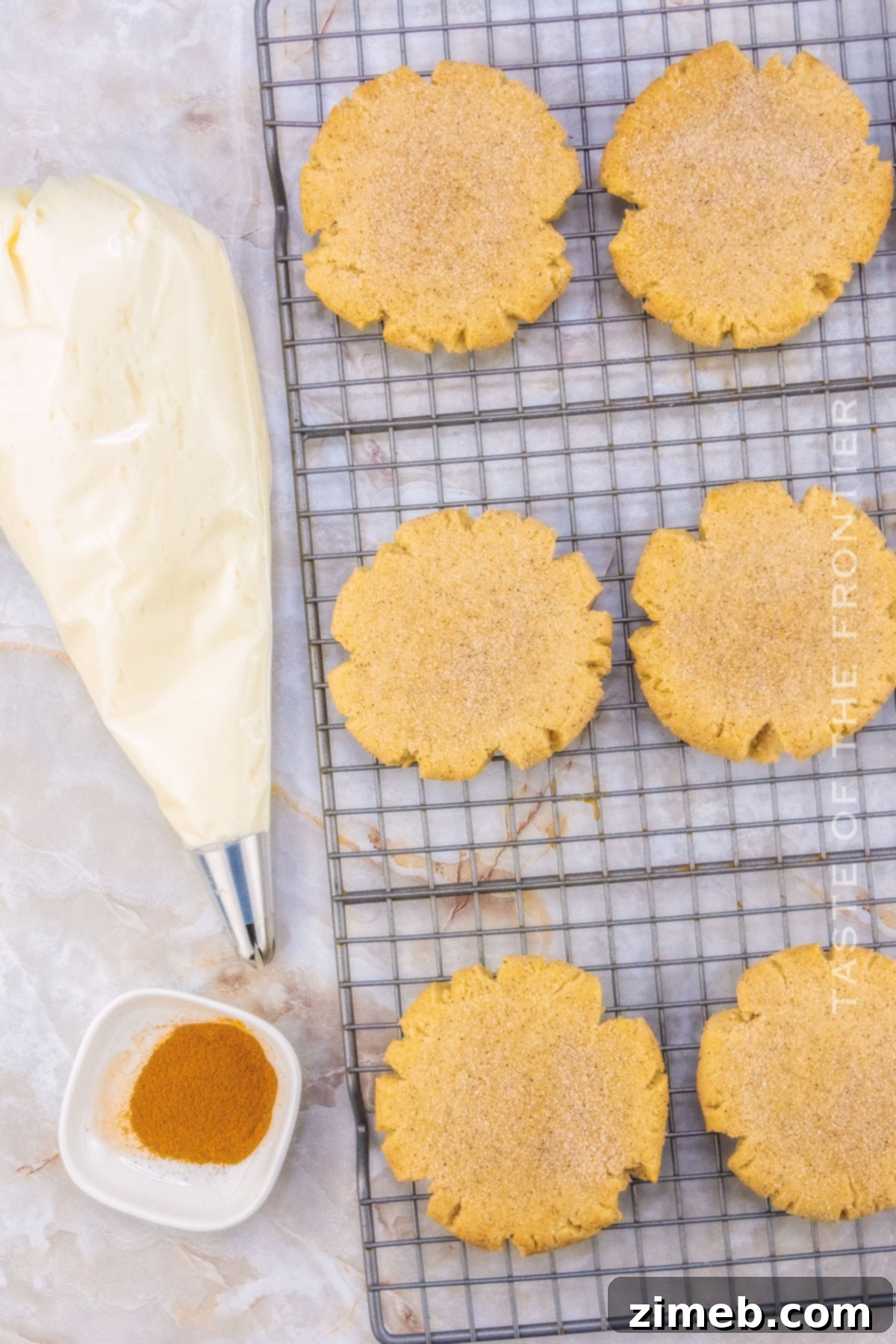 Crumbl Style Snickerdoodle Cookies 6 adding the frosting