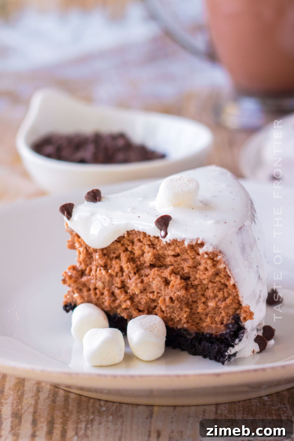 mini slow cooker cheesecake with chocolate drizzle