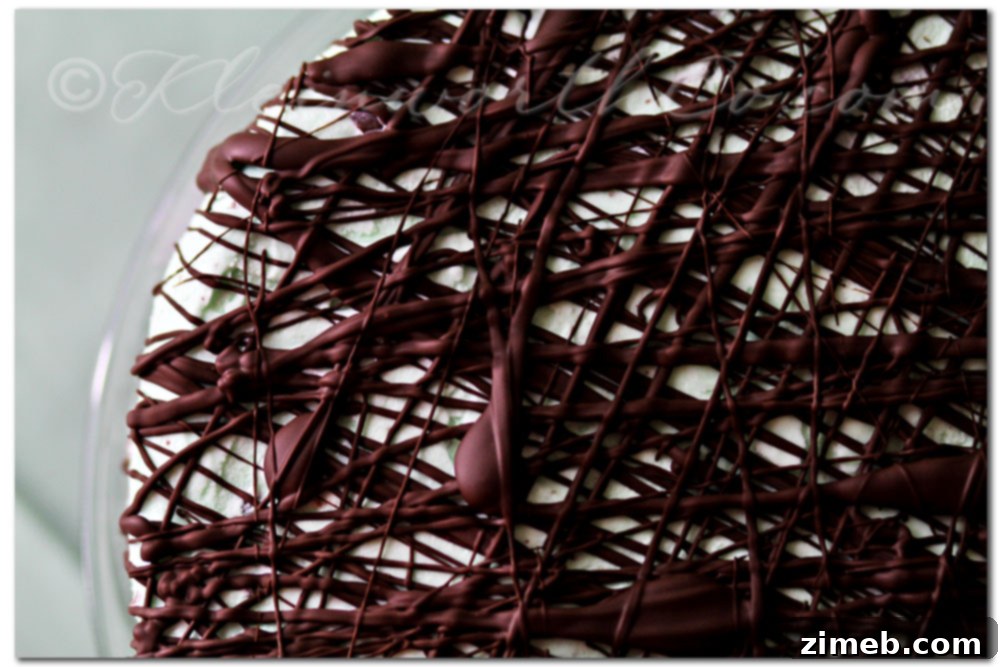 Grasshopper Ice Cream Dream: Weekly Delight 9 Grasshopper Ice Cream Cake, perfectly sliced and ready to serve