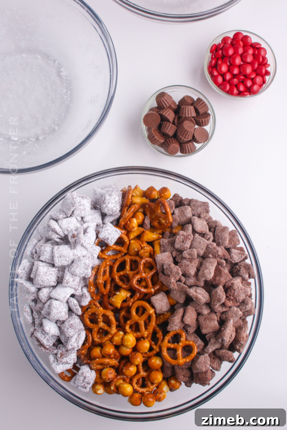 North Pole Nibblers 8 mixing the snack mix recipes together