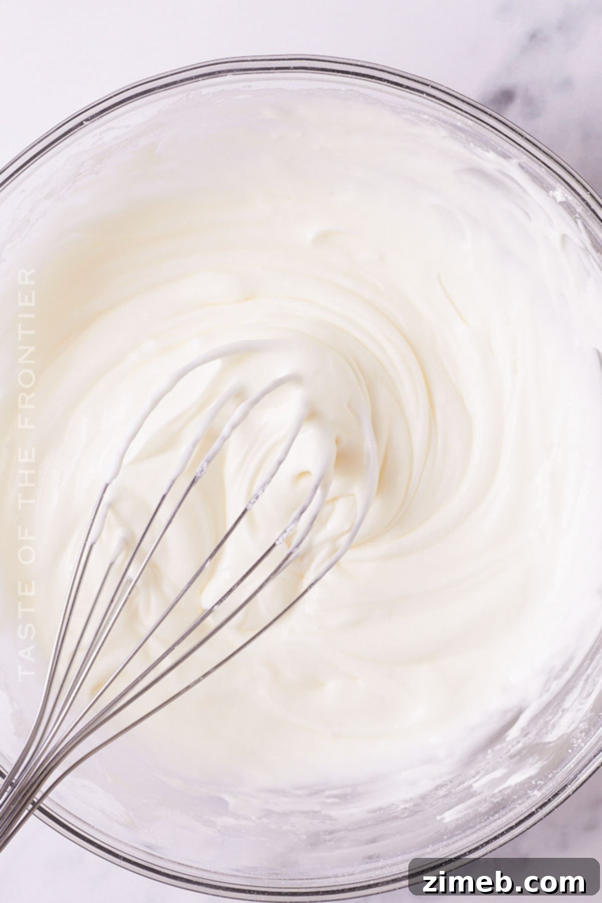 Bundtlet Bliss 6 Close-up of cake glaze being drizzled on mini bundt cakes