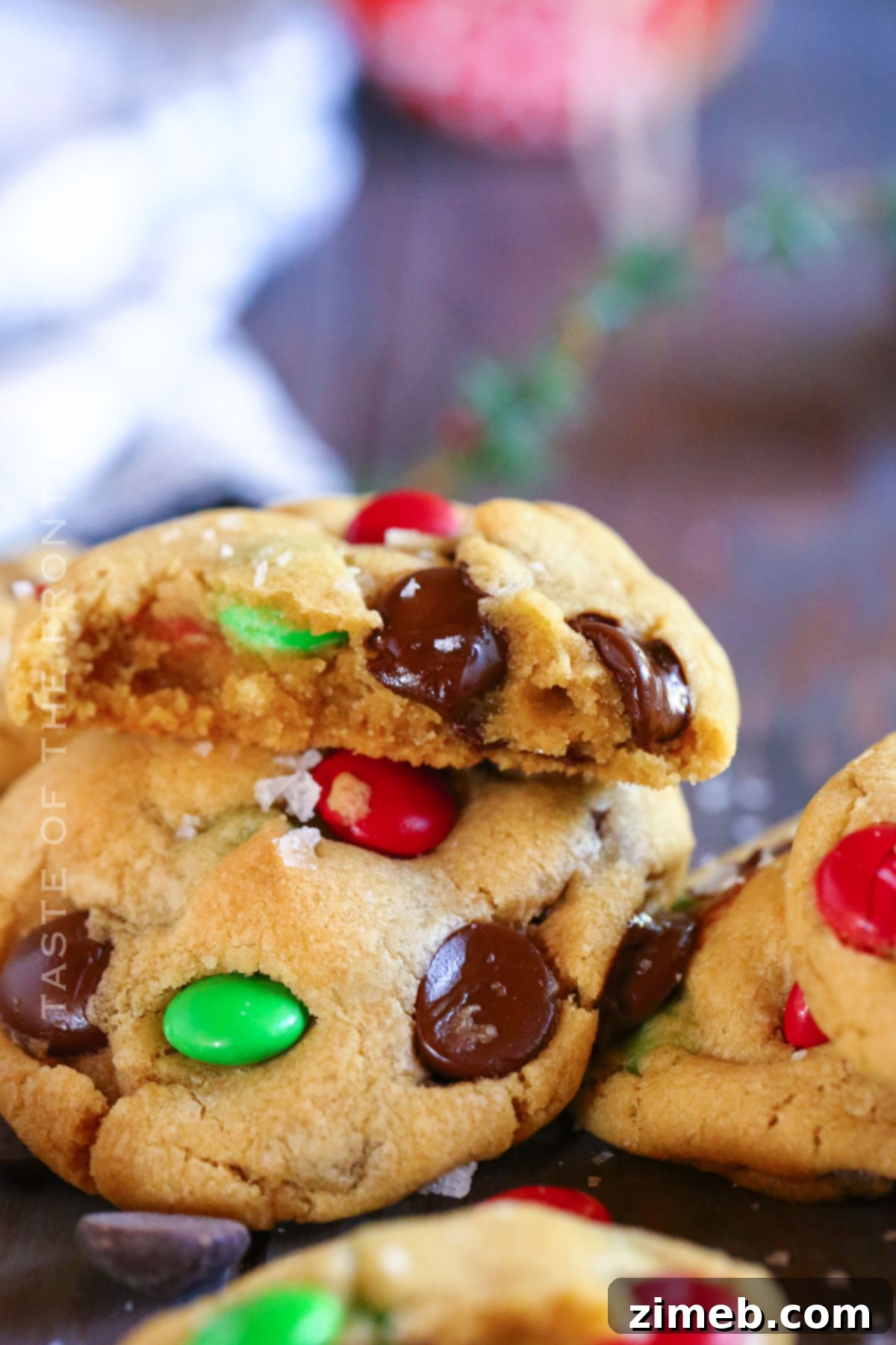 Two rows of Christmas Chocolate Chip Cookies on a baking tray, ready to be cooled
