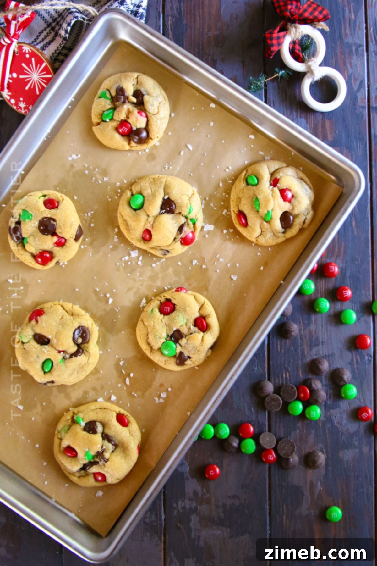 A small batch of Christmas Chocolate Chip Cookies on a cooling rack