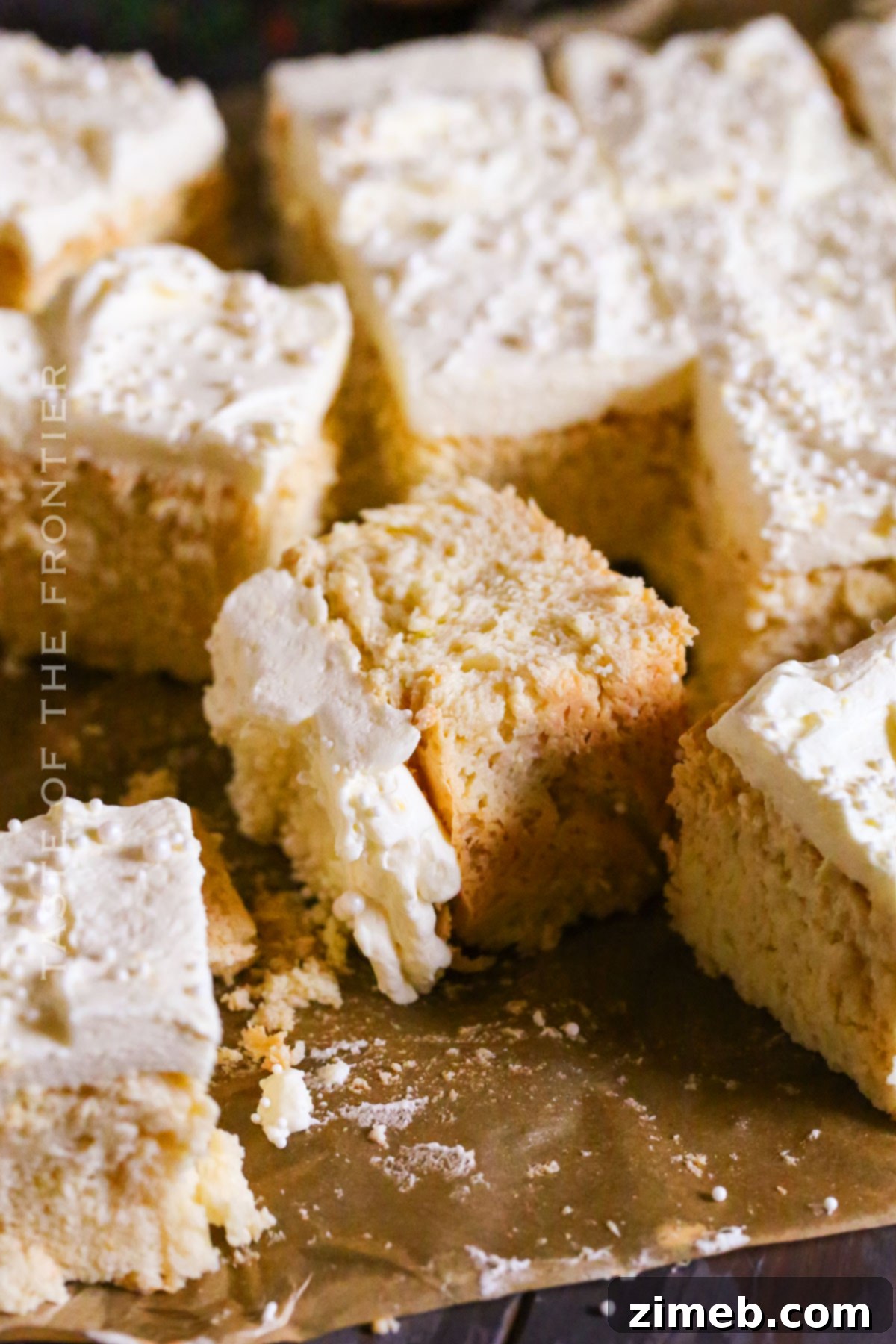 A slice of homemade White Chocolate Mud Cake, perfectly baked and ready to eat.