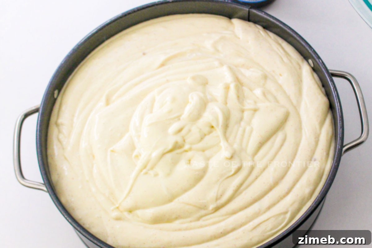 Detailed view of how to make cheesecake filling, smooth and creamy