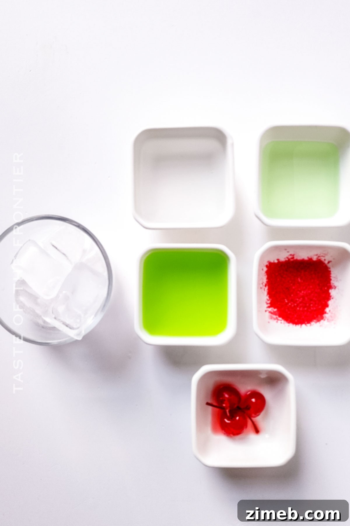 Grinch Cocktail and non-alcoholic Grinch Punch ingredients ready to mix