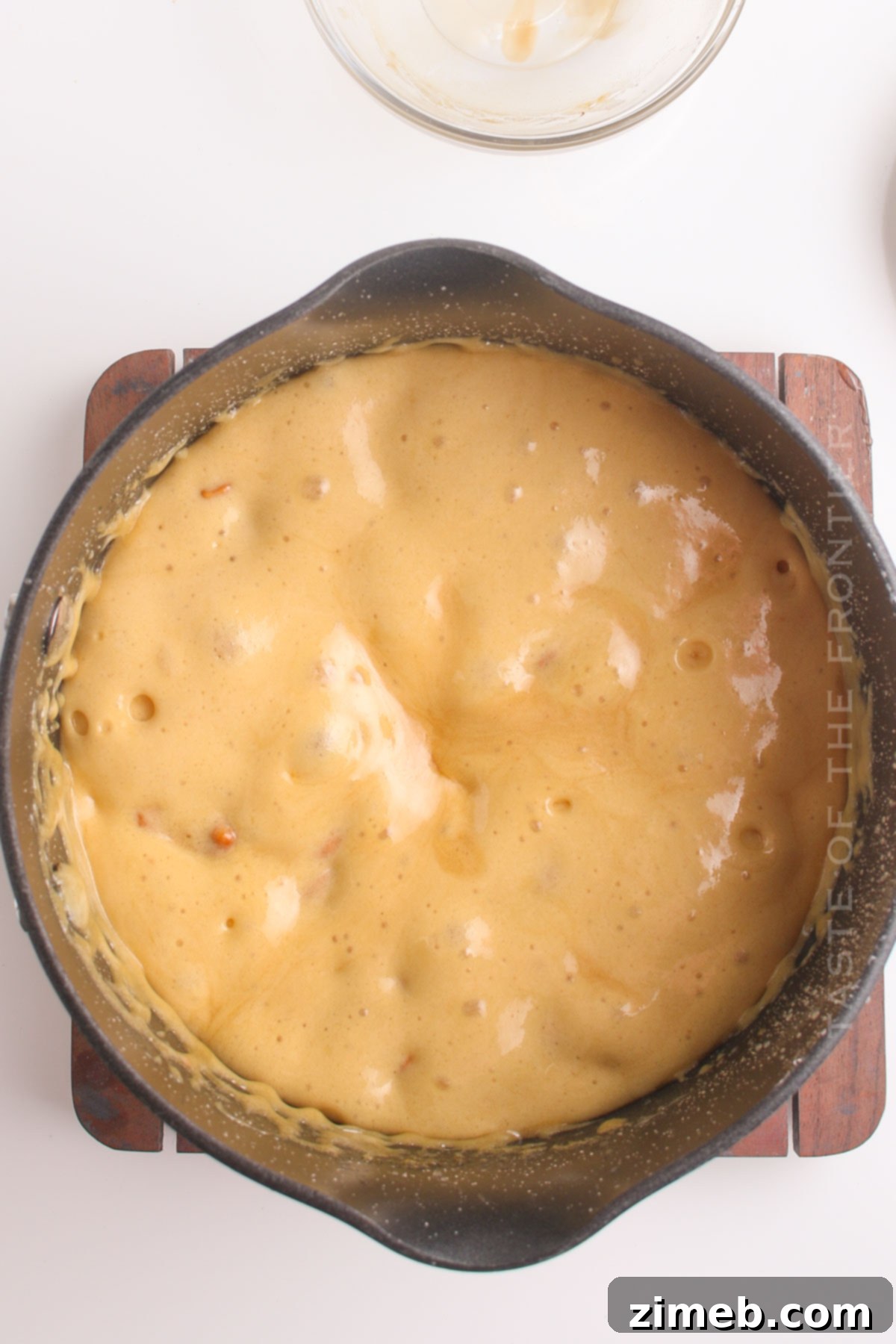 Cooked Candy - Golden Cashew Brittle Setting on the Pan