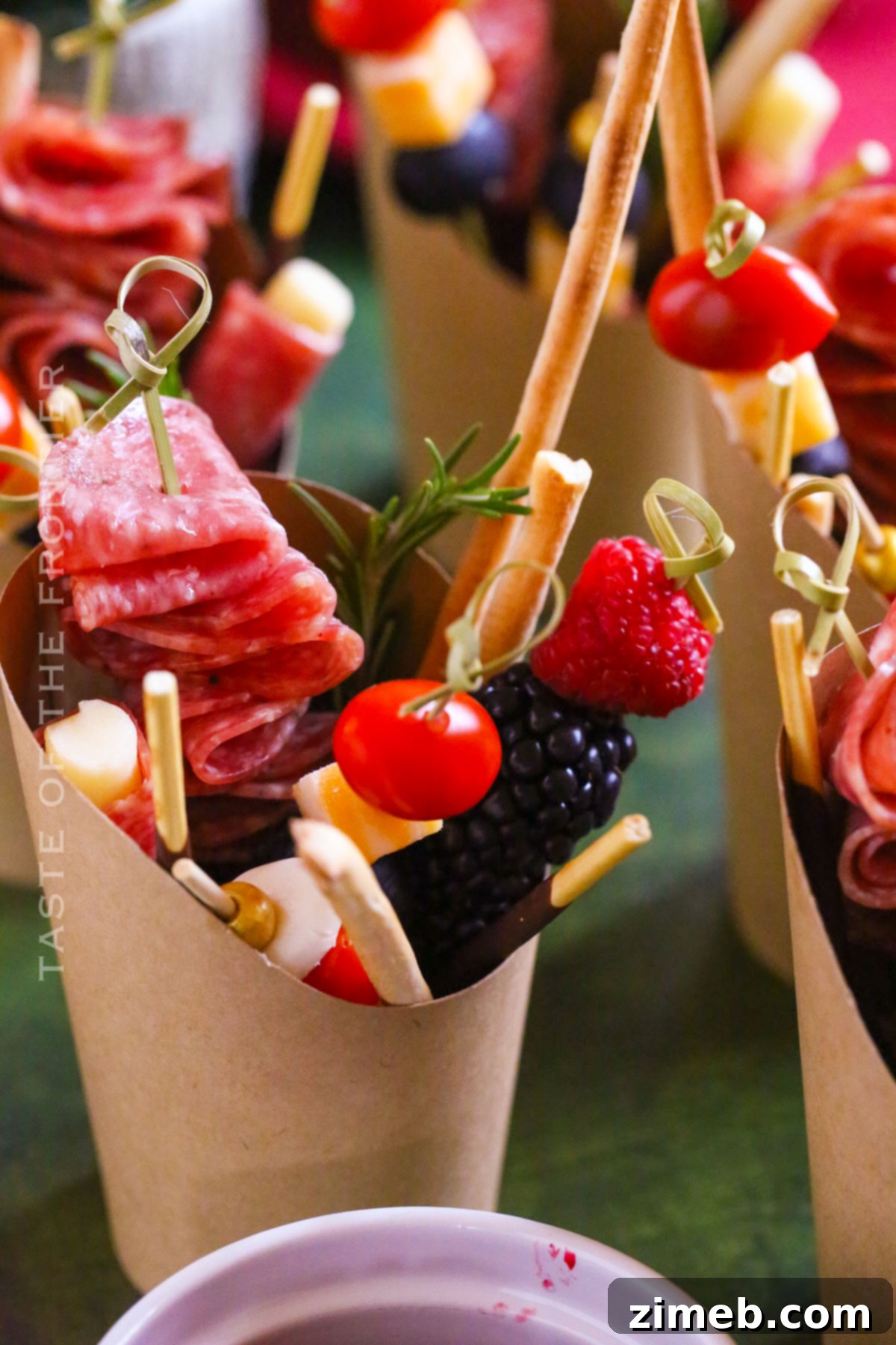 Assorted party snacks in cups