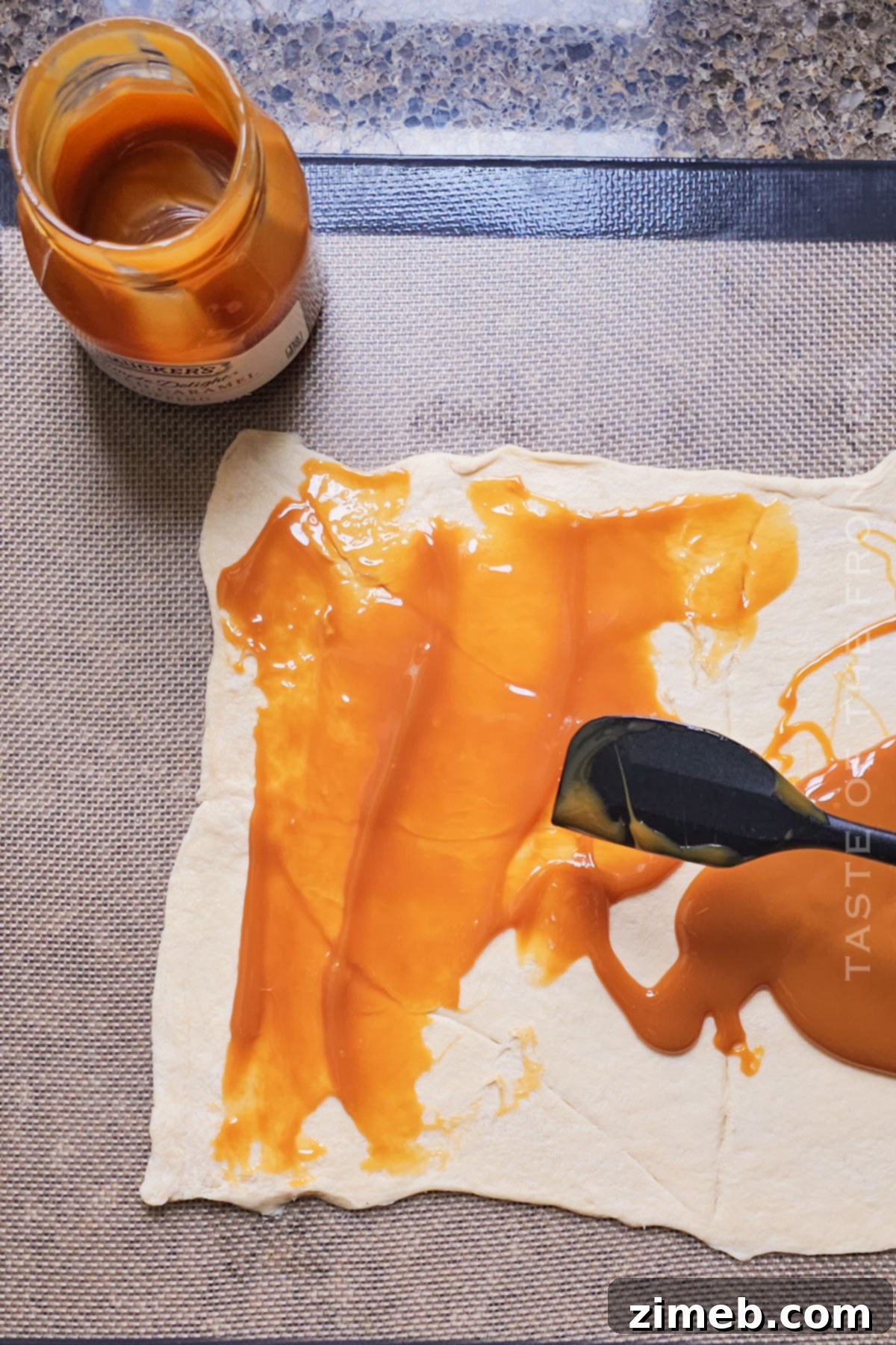adding caramel filling