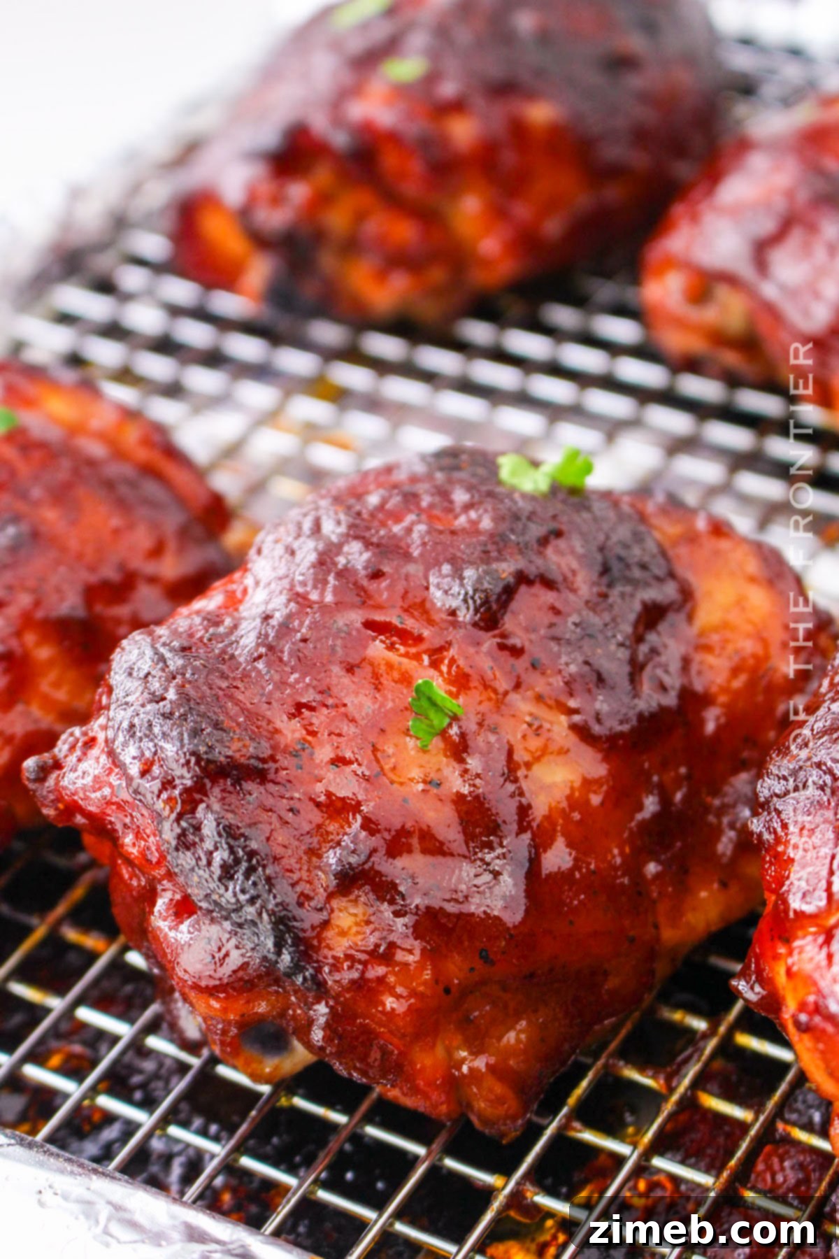 Oven Baked BBQ Chicken Thighs 2 Oven Chicken Thighs BBQ - Delicious baked chicken with a rich barbecue glaze