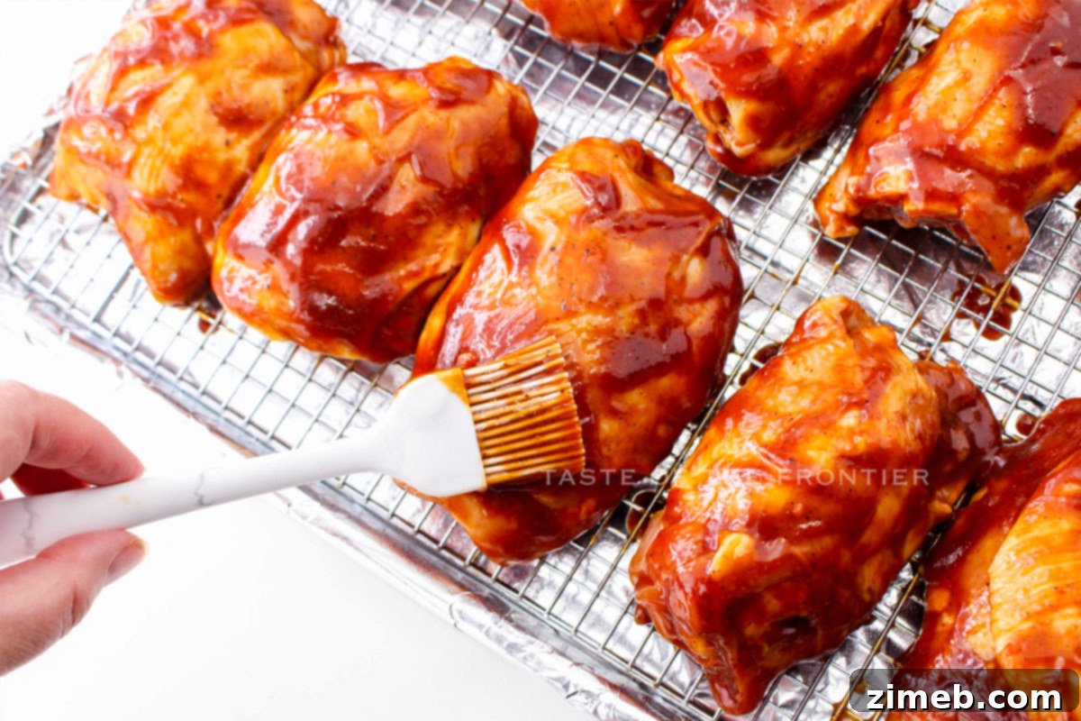 Oven Baked BBQ Chicken Thighs 6 Step-by-step image showing how to prepare Oven Chicken Thighs BBQ, from coating to baking.